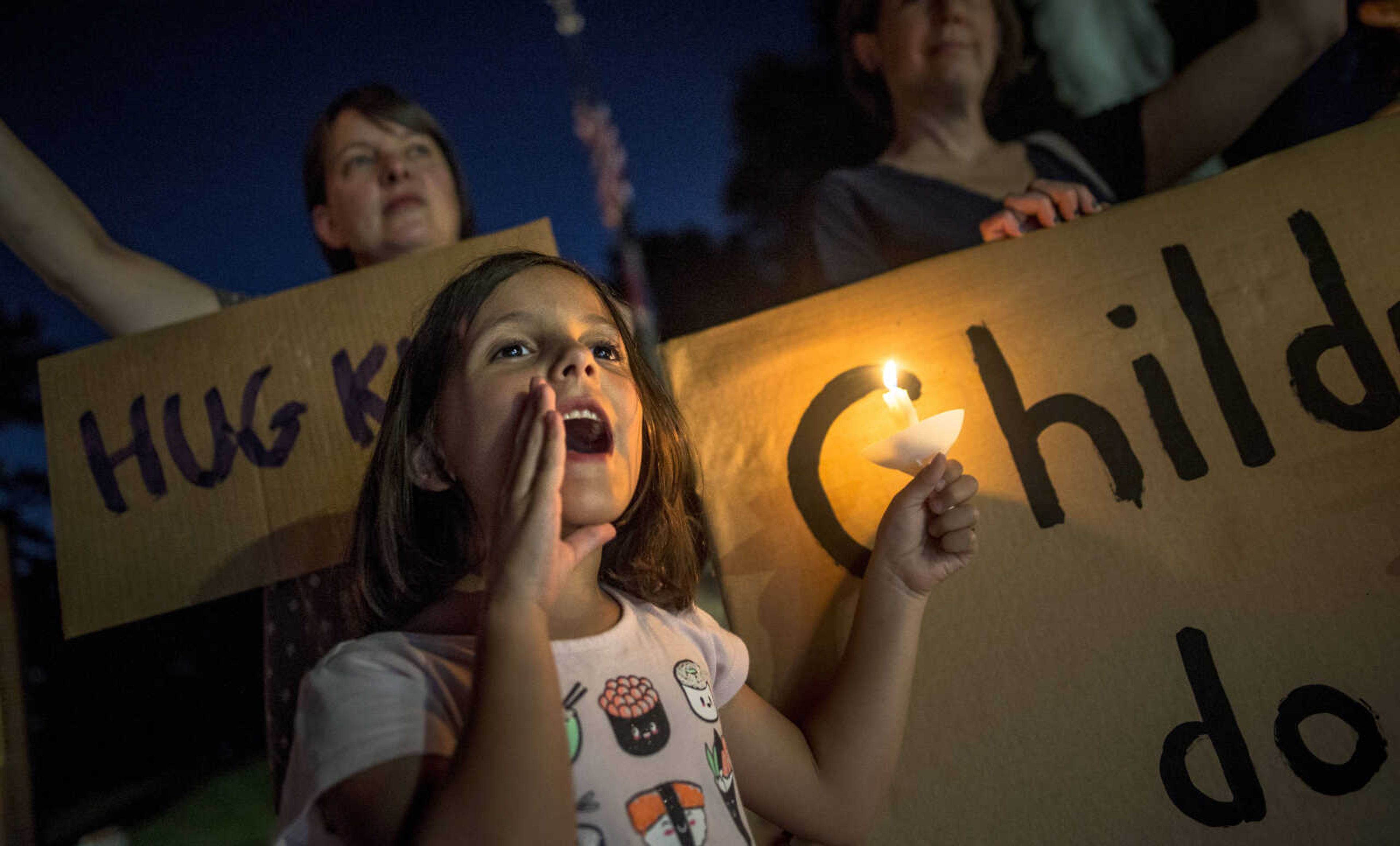 Willow Rieger, 6, yells "children don't belong in cages!" to a passing vehicle while demonstrating with dozens of other protesters Friday, July 12, 2019, at Capaha Park's Freedom Corner in Cape Girardeau. The demonstration was held to denounce controversial U.S. immigration policy as well as subpar conditions in migrant detention centers which have become a cultural flashpoint in recent weeks.