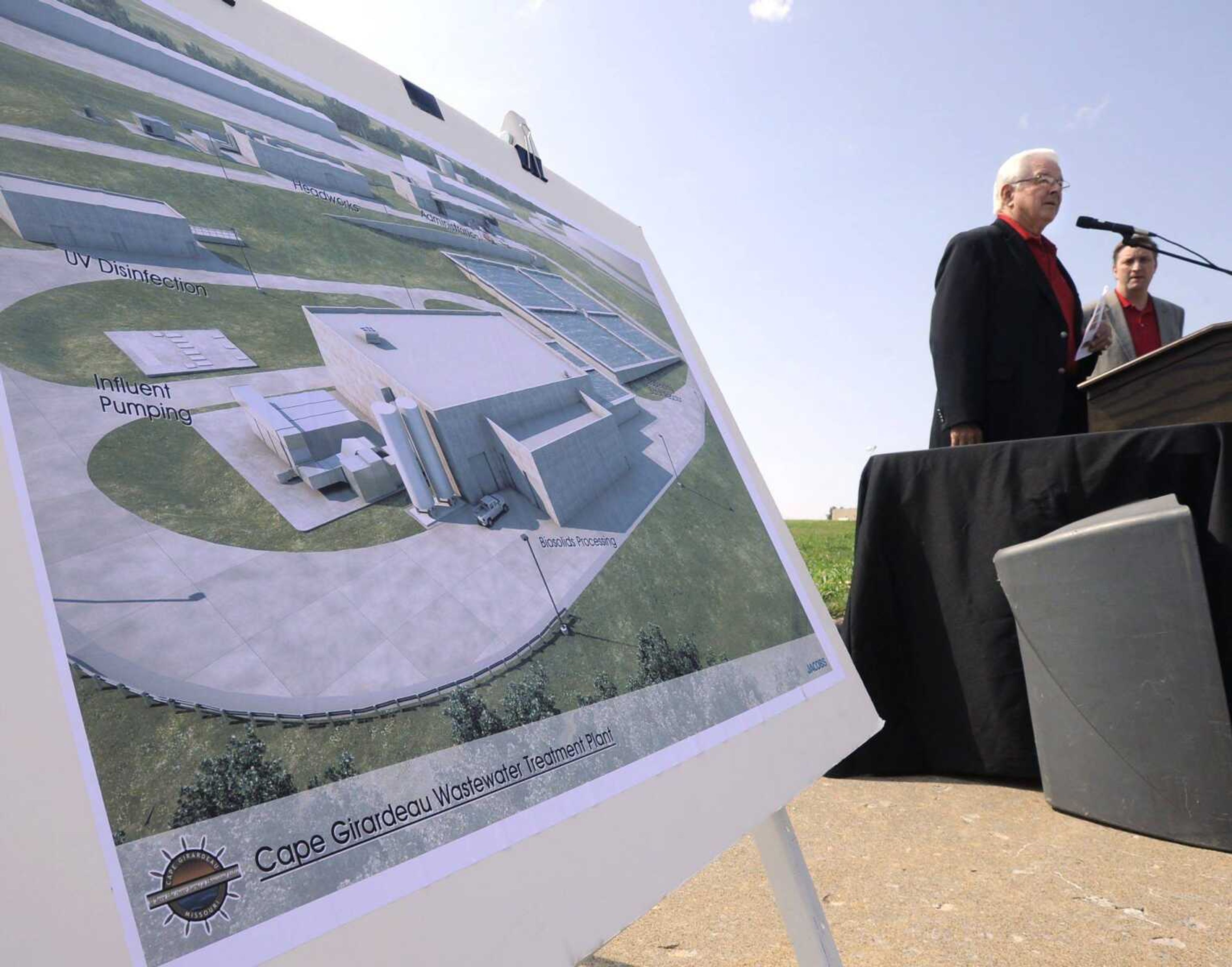 Mayor Harry Rediger speaks at a groundbreaking ceremony Friday for the Cape Girardeau wastewater treatment plant as city manager Scott Meyer listens. (Fred Lynch)