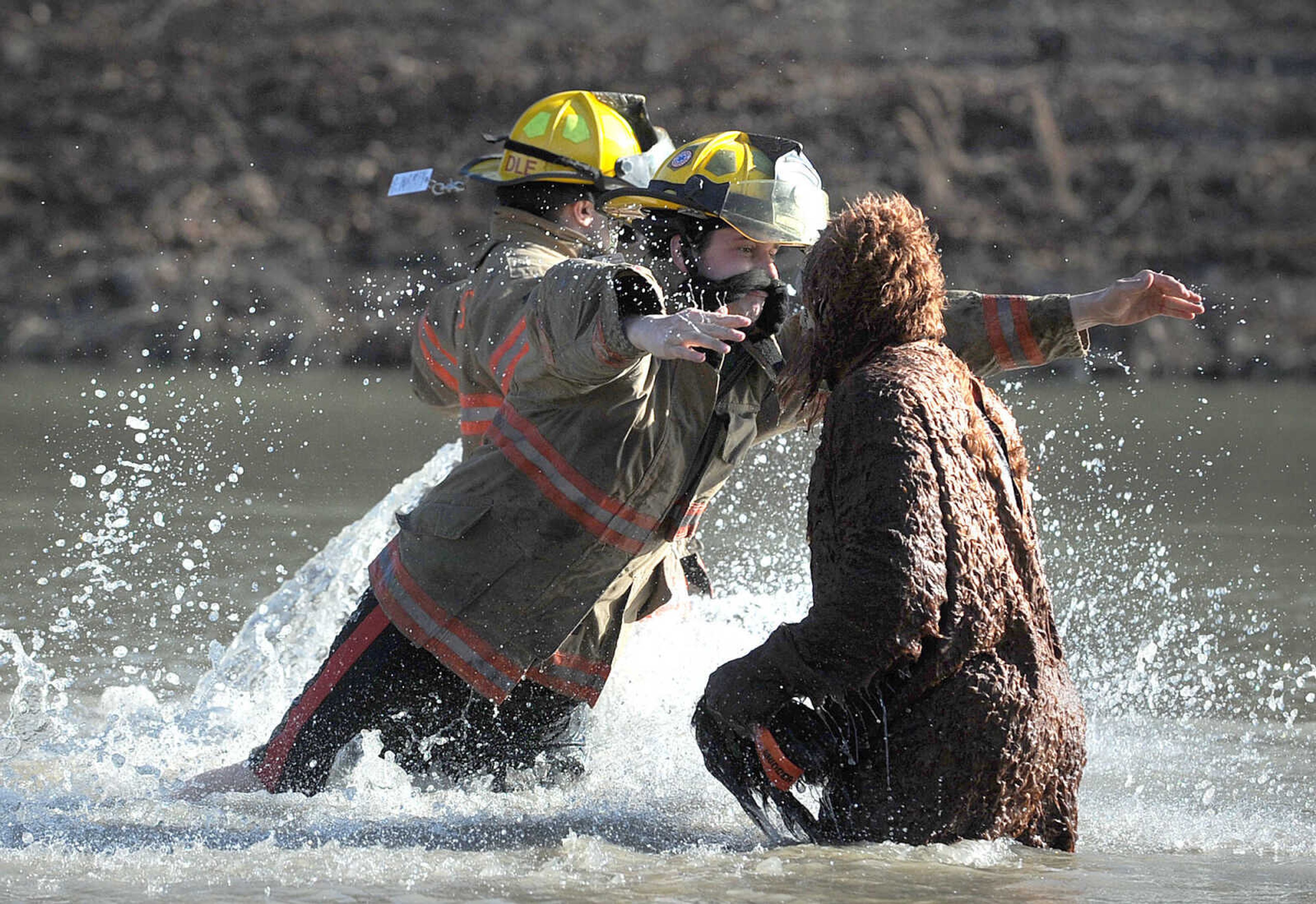 LAURA SIMON ~ lsimon@semissourian.com
People plunge into the cold waters of Lake Boutin Saturday afternoon, Feb. 2, 2013 during the Polar Plunge at Trail of Tears State Park. Thirty-six teams totaling 291 people took the annual plunge that benefits Special Olympics Missouri.