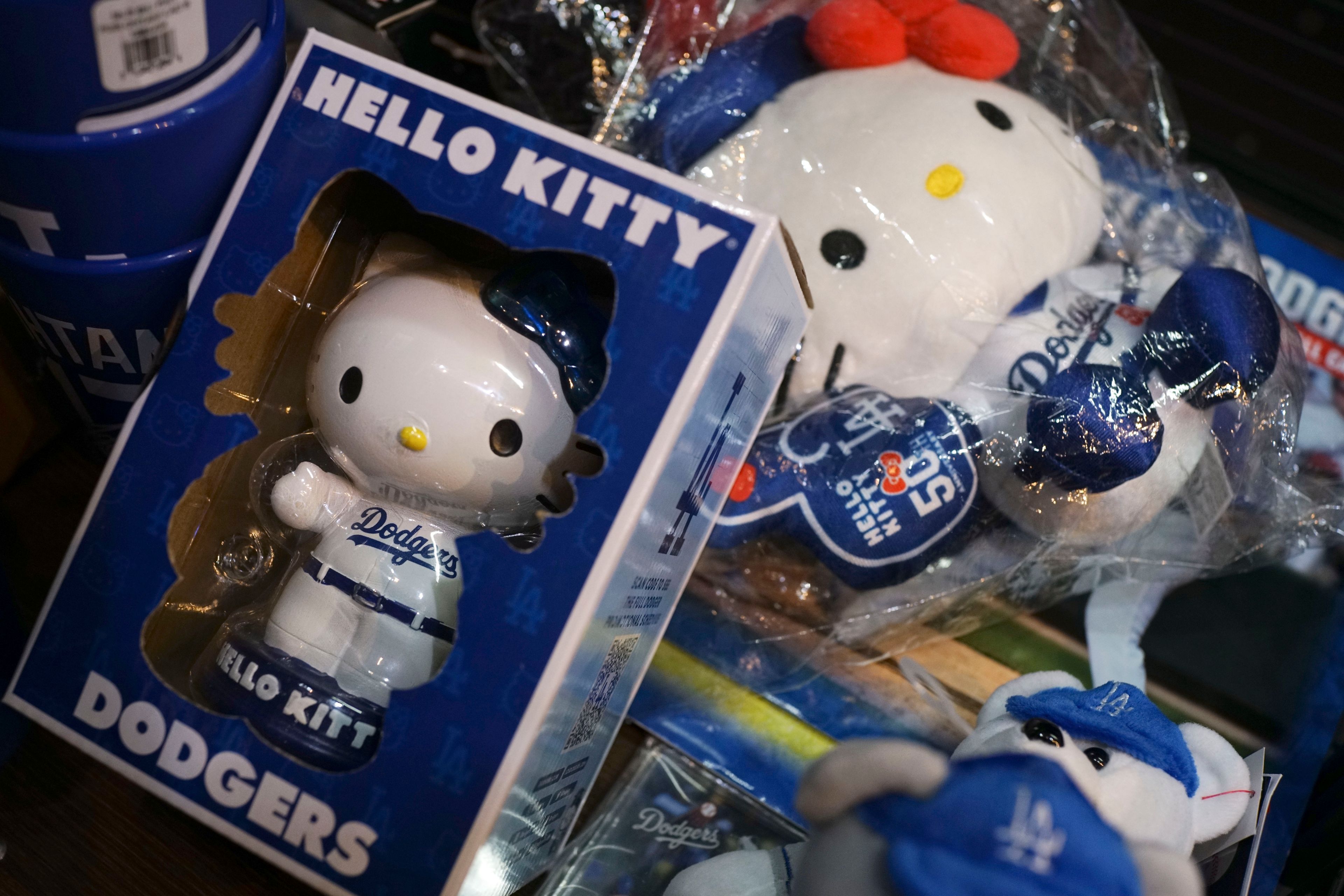 The 50th anniversary Hello Kitty dolls with Los Angeles Dodgers uniform are sold at a shop Wednesday, Oct. 23, 2024 in Tokyo. (AP Photo/Eugene Hoshiko)