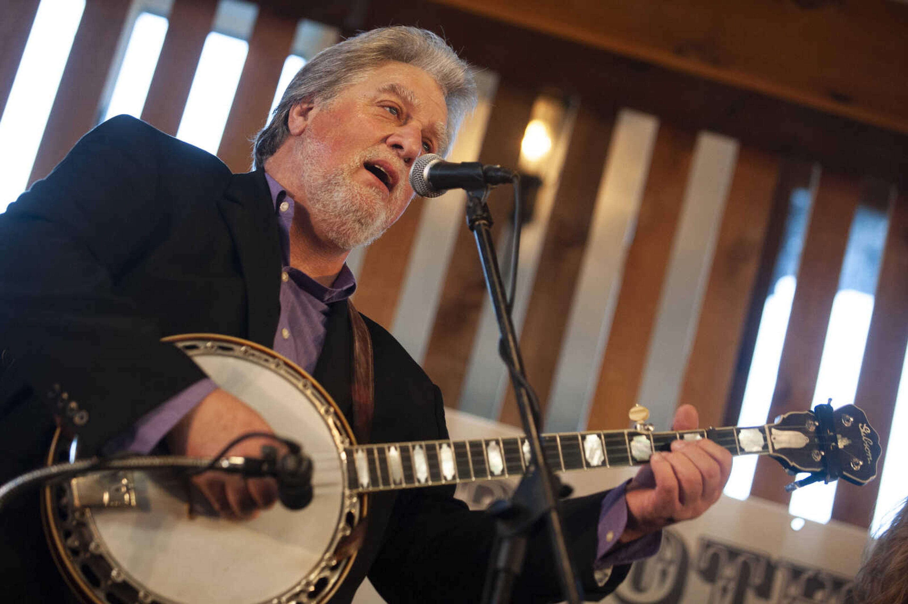 Mike Harman of Alton, Illinois, performs with members of his family at the Bootheel Bluegrass Festival on Friday, Jan. 25, 2019, at the Bavarian Halle in Fruitland. The festival continues Saturday with more bluegrass.