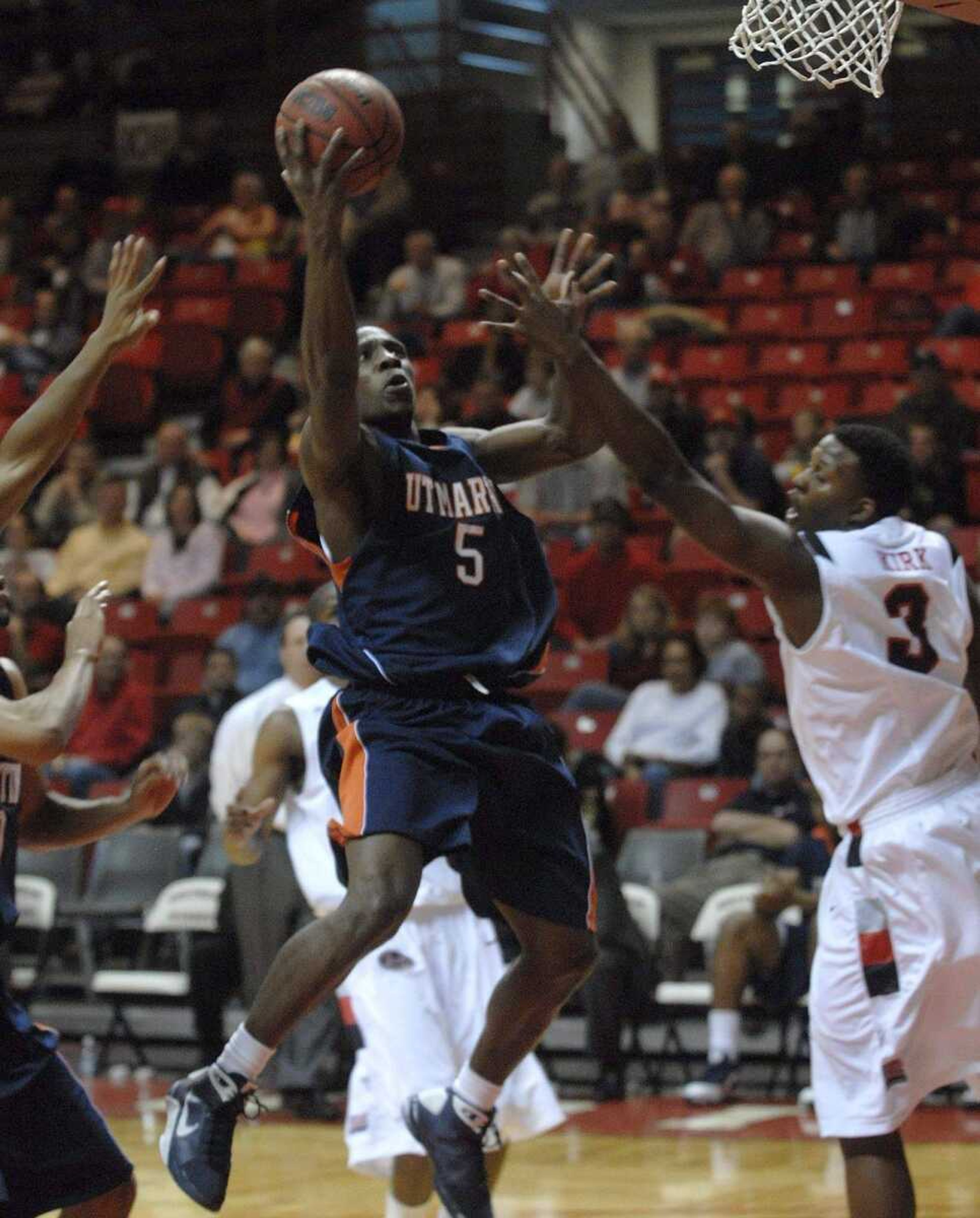 FRED LYNCH ~ flynch@semissourian.com<br>Tennessee-Martin's Lester Hudson shoots over Southeast Missouri State's Israel Kirk during the second half Monday at the Show Me Center. Hudson scored 22 of his 38 points in the second half.