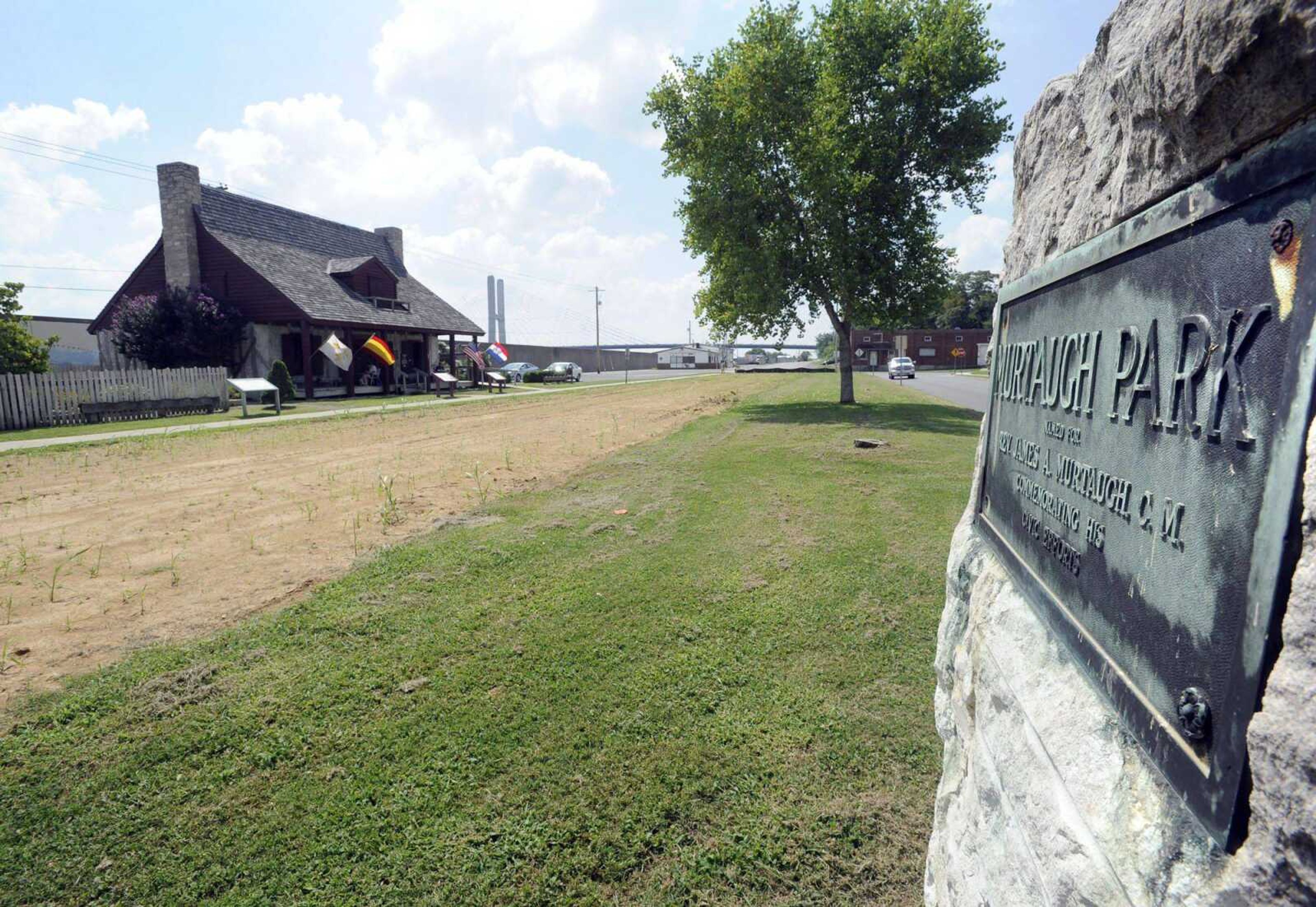 Murtaugh Park is seen Saturday next to the Red House Interpretive Center in Cape Girardeau. The park is being enlarged by filling in the former Aquamsi Street. The park was dedicated in 1928 in memory of the Rev. James A. Murtaugh, C.M., a civic-minded Catholic priest who served the Vincentian parish and schools here. (Fred Lynch)