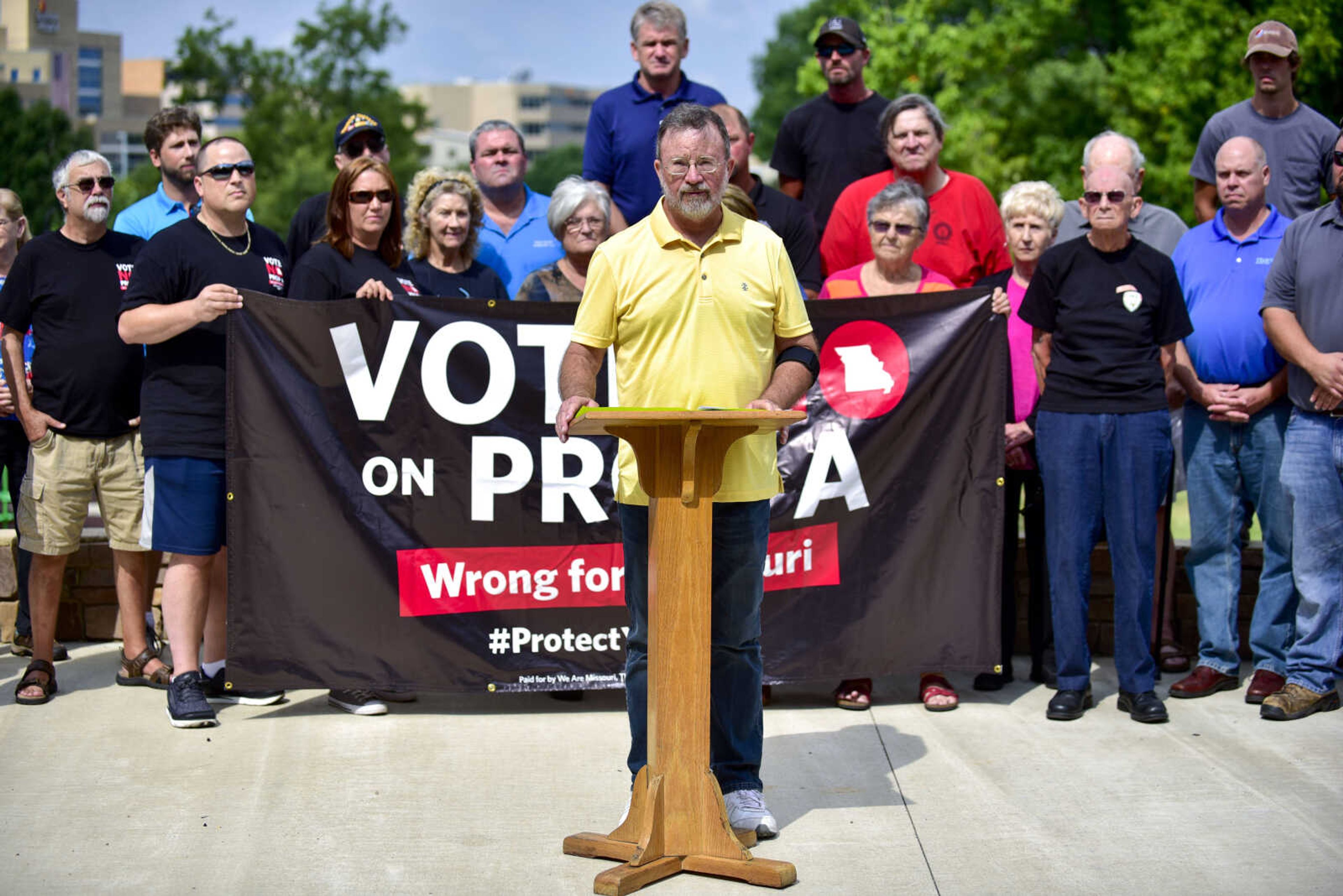 Jesse Isbell explains how he lost his job in Oklahoma after passage of a law similar to Proposition A while speaking at a rally Monday, July 23, 2018, at Capaha Park in Cape Girardeau.