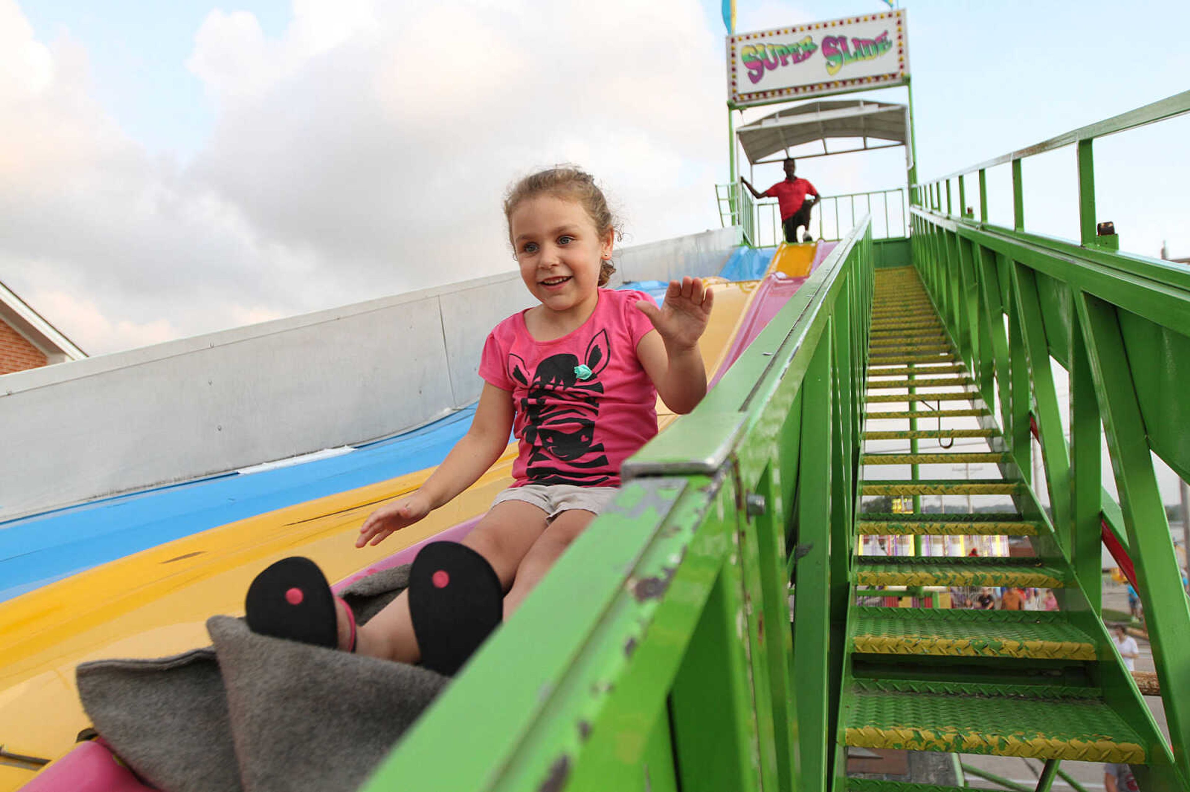 GLENN LANDBERG ~ glandberg@semissourian.com


Audrey Moore rides down the Super Slide Wednesday, July 23, 2014 during the 106th Jackson Homecomers.