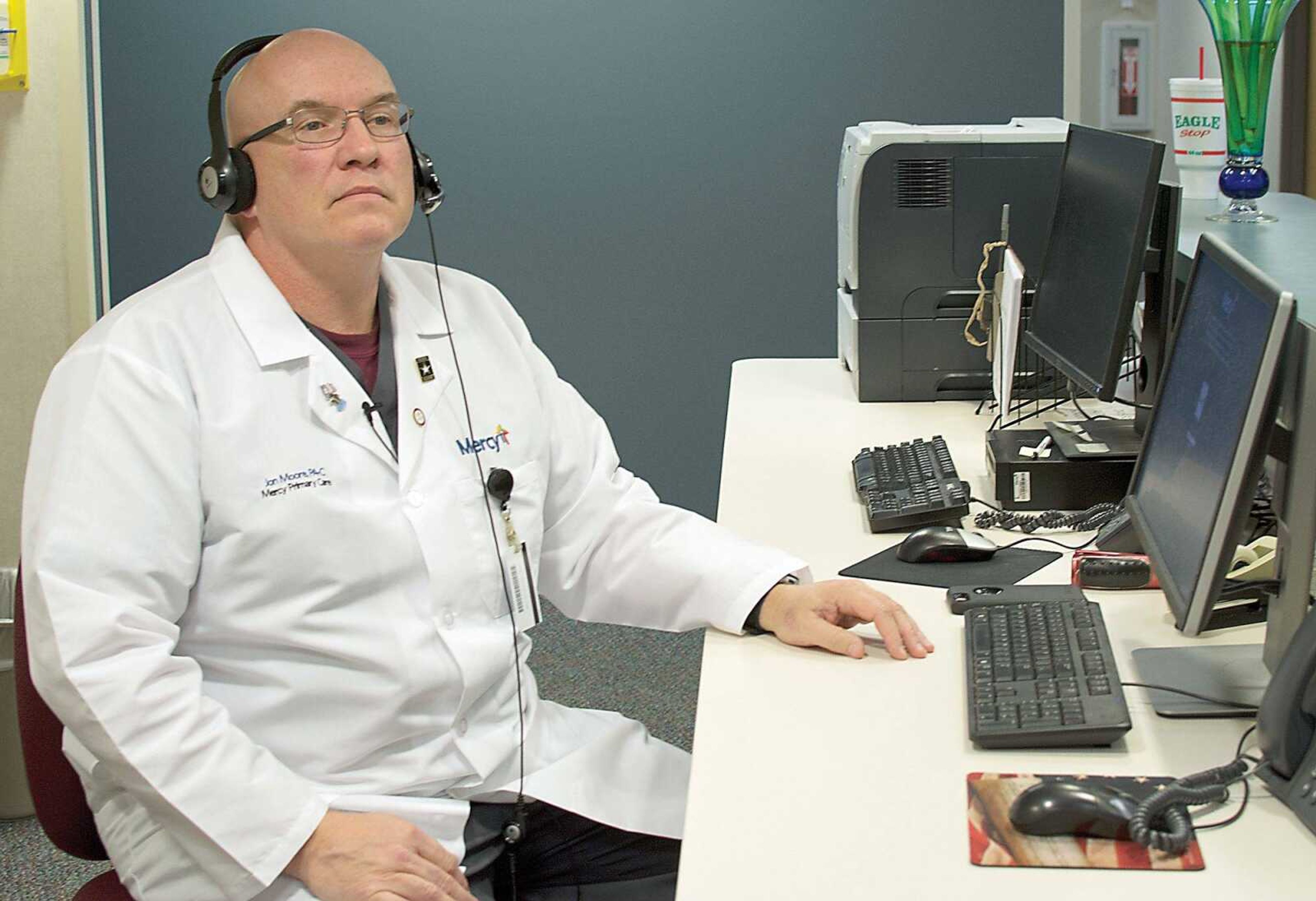 Dr. Jon Moore explains how a telehealth session is conducted Dec. 5 in St. Robert, Missouri. Moore is a physician's assistant of dermatology at Mercy Clinic Family Medicine in St. Robert. Moore uses telemedicine to aid in treating some of his patients.