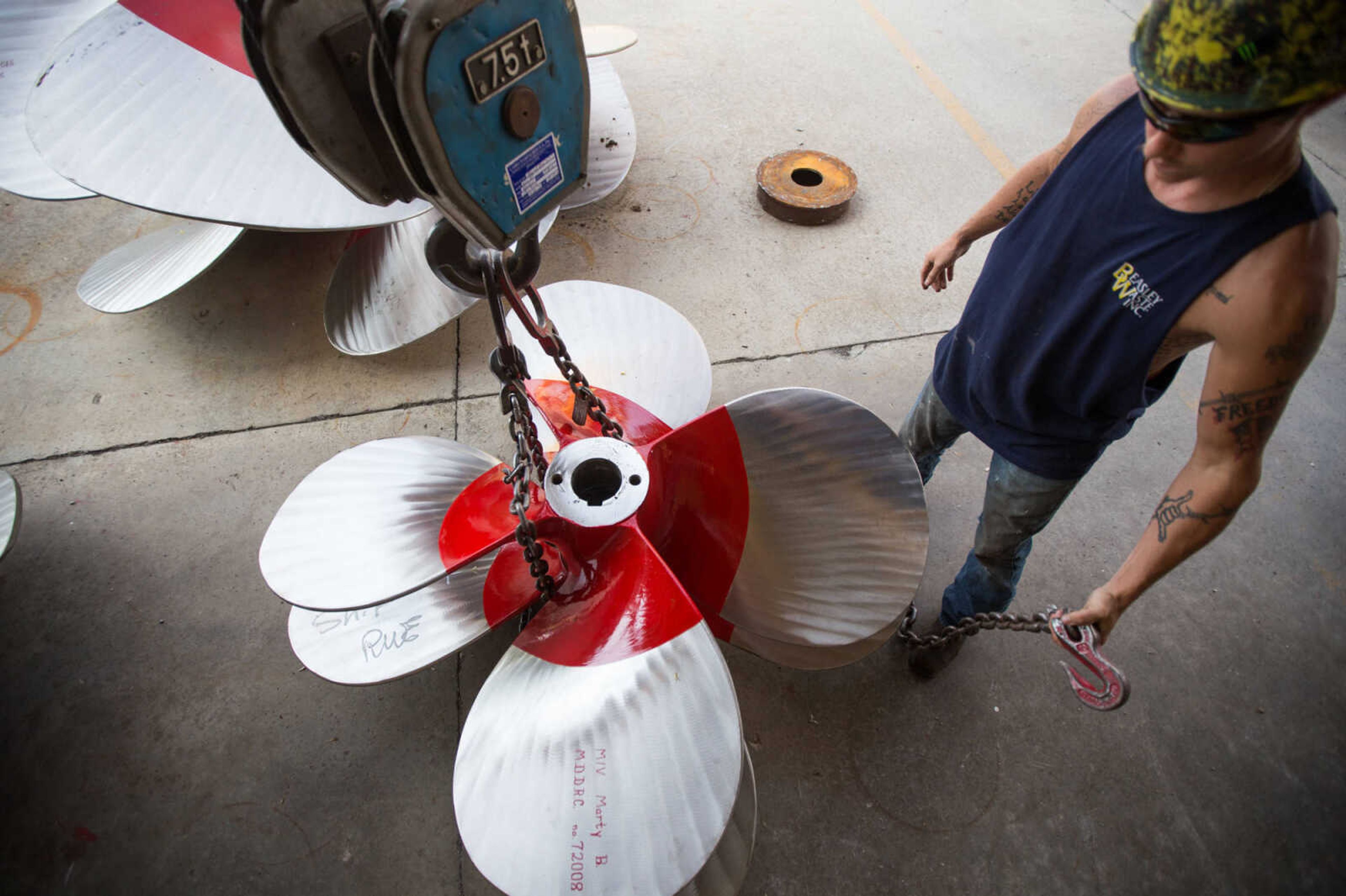 GLENN LANDBERG ~ glandberg@semissourian.com


Keegan Hale hooks chains to a propeller that will be moved by a crane outside the repair shop at Missouri Dry Dock and Repair Co. in Cape Girardeau Wednesday, July 28, 2016.