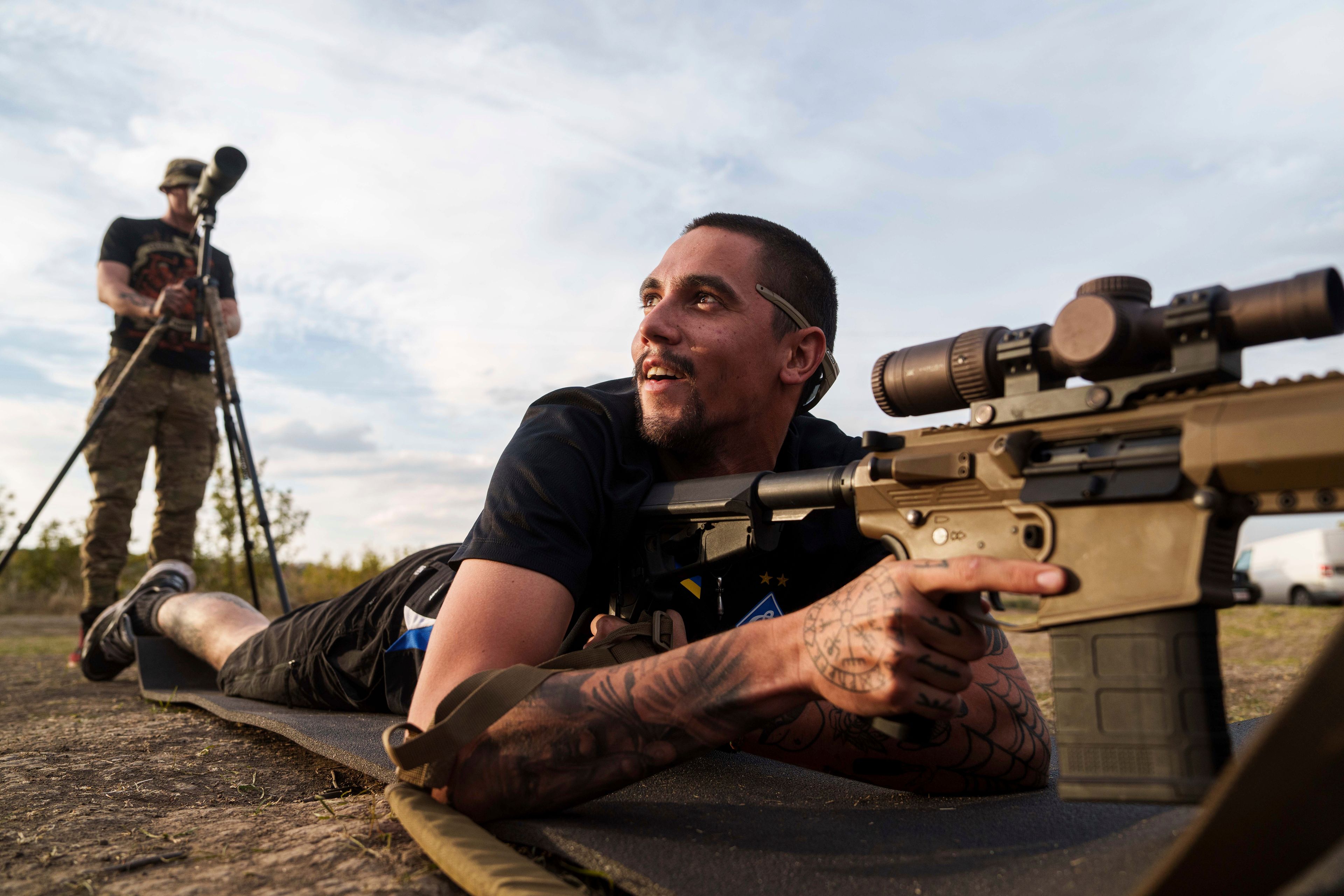 Ukrainian serviceman known by the call sign "Shtahet" of the 3rd assault brigade trains to fire by his rifle at the polygon in Kharkiv region, Ukraine, Thursday Sept. 26, 2024. (AP Photo/Evgeniy Maloletka)