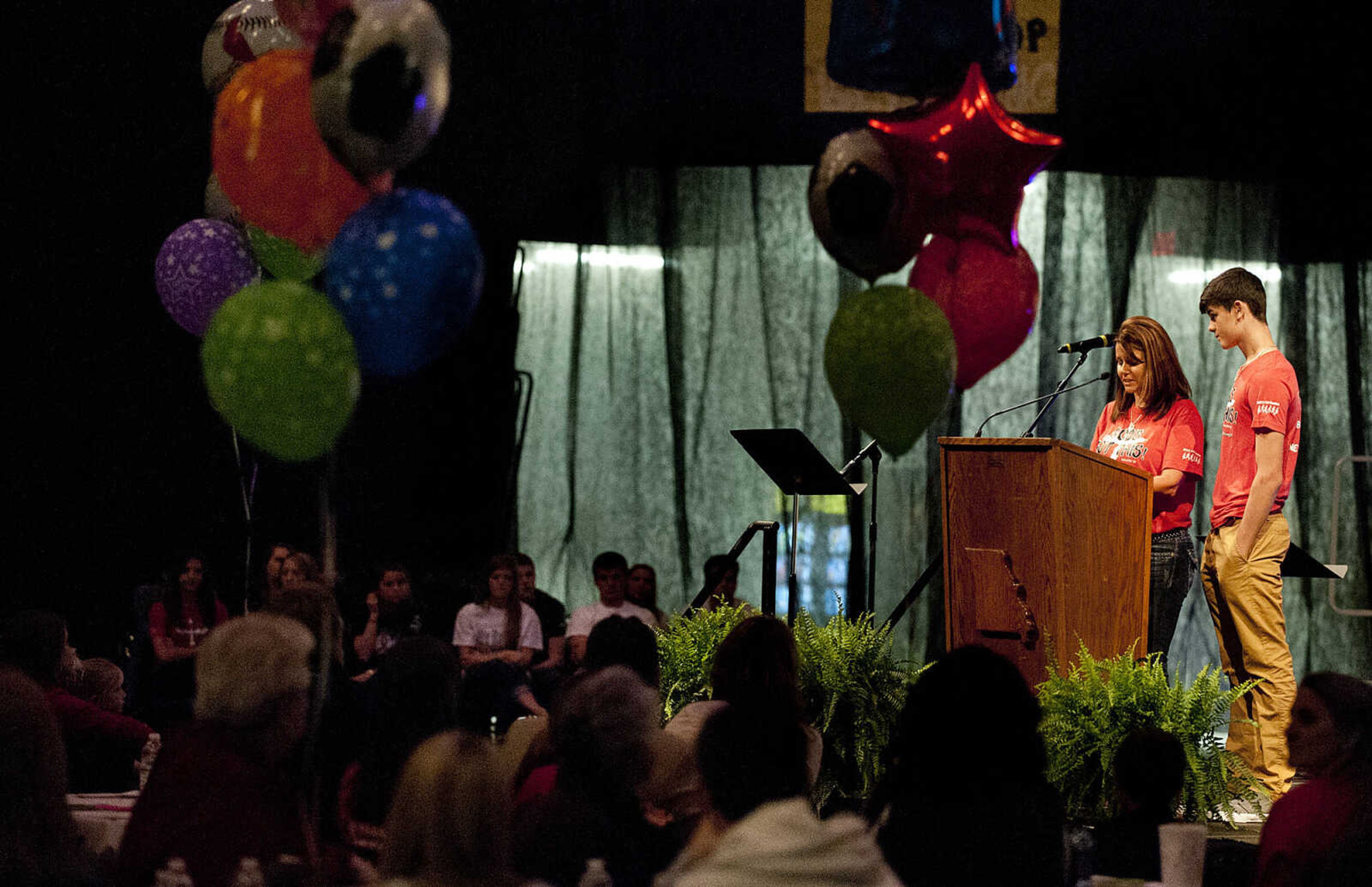 Rachelle, left, and Colton Weber welcome attendees to "Nolan Weber, Celebration of Life," Wednesday, April 30, at the Jackson High School Event Center. Friends, family and community members gathered to remember the former Jackson High School baseball and soccer player who passed away from brain cancer in December on what would have been Nolan's 19th birthday.