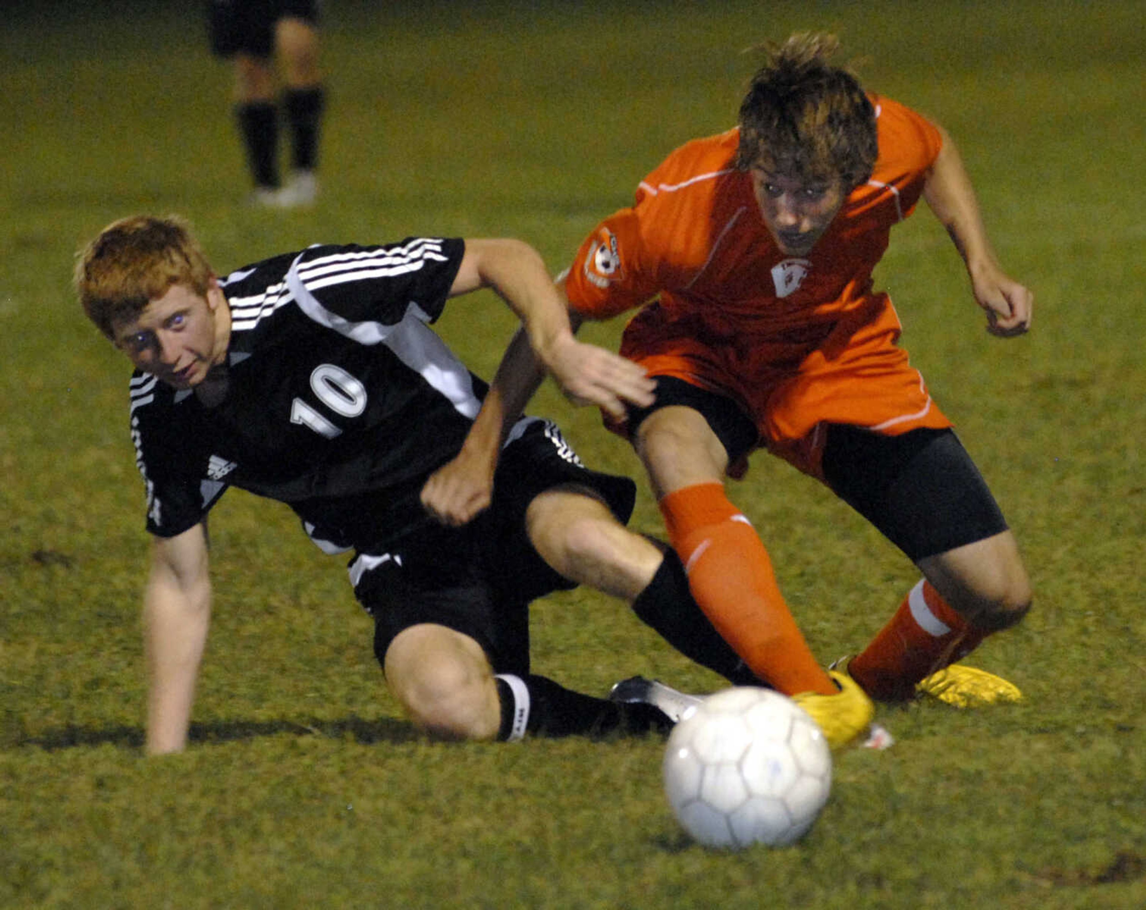 FRED LYNCH ~ flynch@semissourian.com
Jackson's Tyson Stoverink, left, challenges Central's Spencer Lovig for possession during the first half Tuesday at Central.