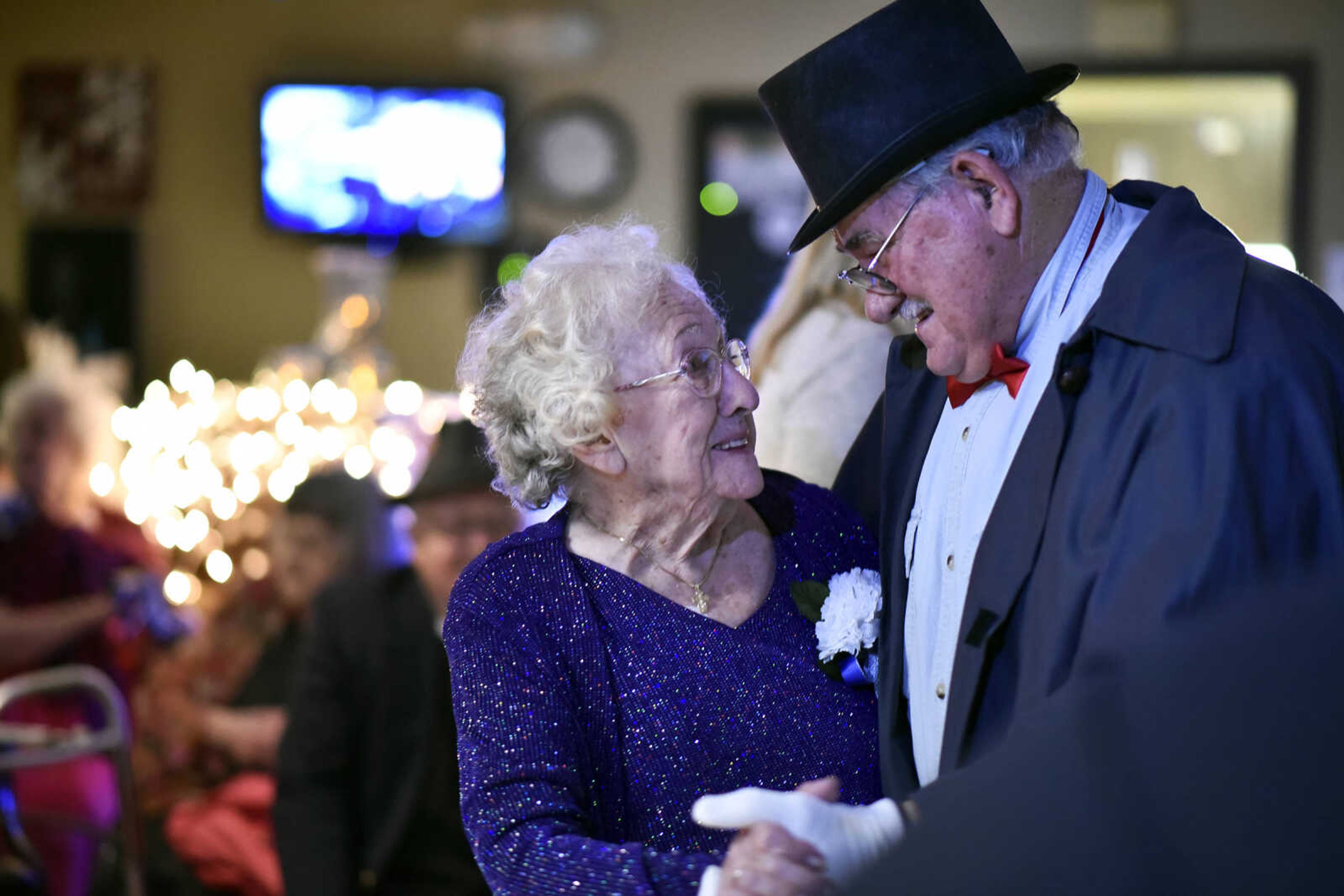 Alida Goodpasture and Dale Ratliff take a spin on the dance floor during the "Celebration of Life" winter ball on Tuesday, Jan. 9, 2017, at Ratliff Care Center in Cape Girardeau.