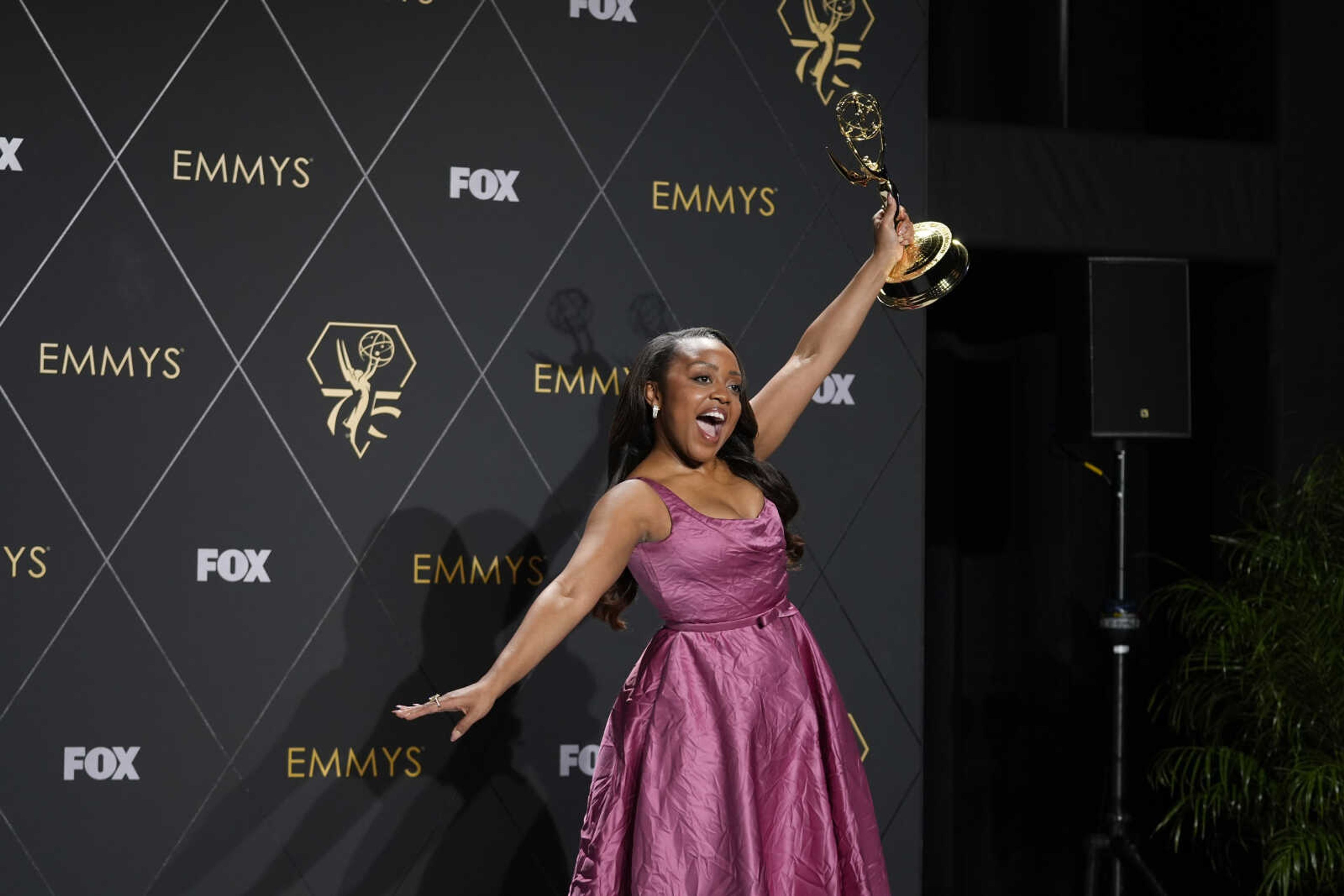 Quinta Brunson, winner of the award for outstanding lead actress in a comedy series for "Abbott Elementary", poses in the press room during the 75th Primetime Emmy Awards on Monday at the Peacock Theater in Los Angeles.