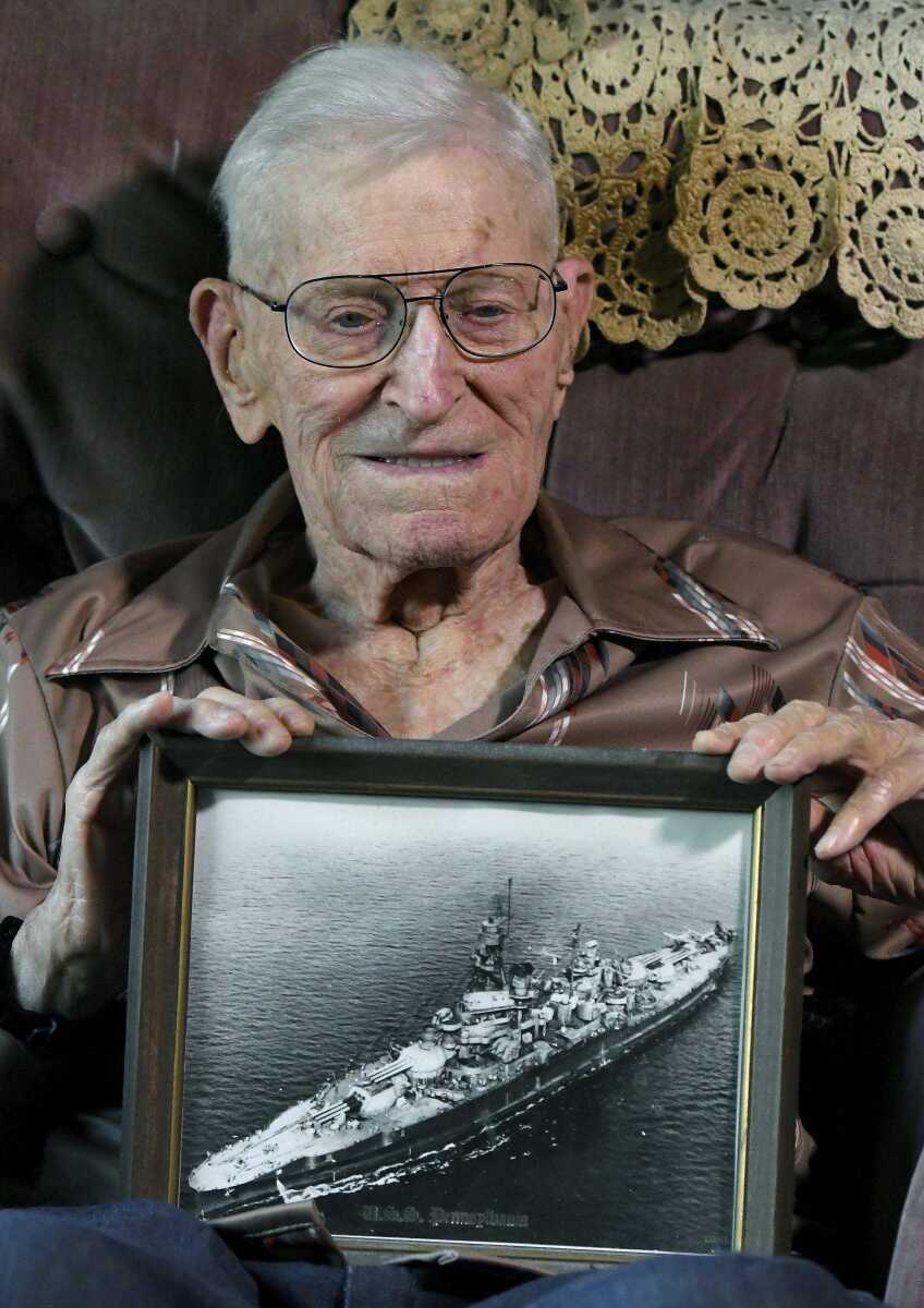 Pearl Harbor survivor Earl Wanbaugh, 98, sits in his Independence, Missouri, home.