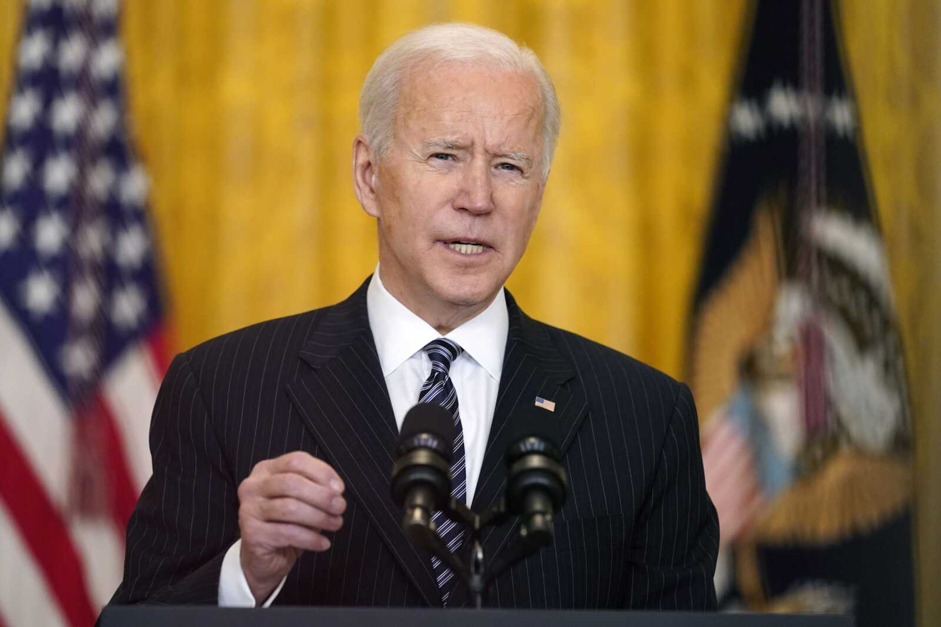 President Joe Biden speaks about COVID-19 vaccinations from the East Room of the White House on Thursday in Washington.