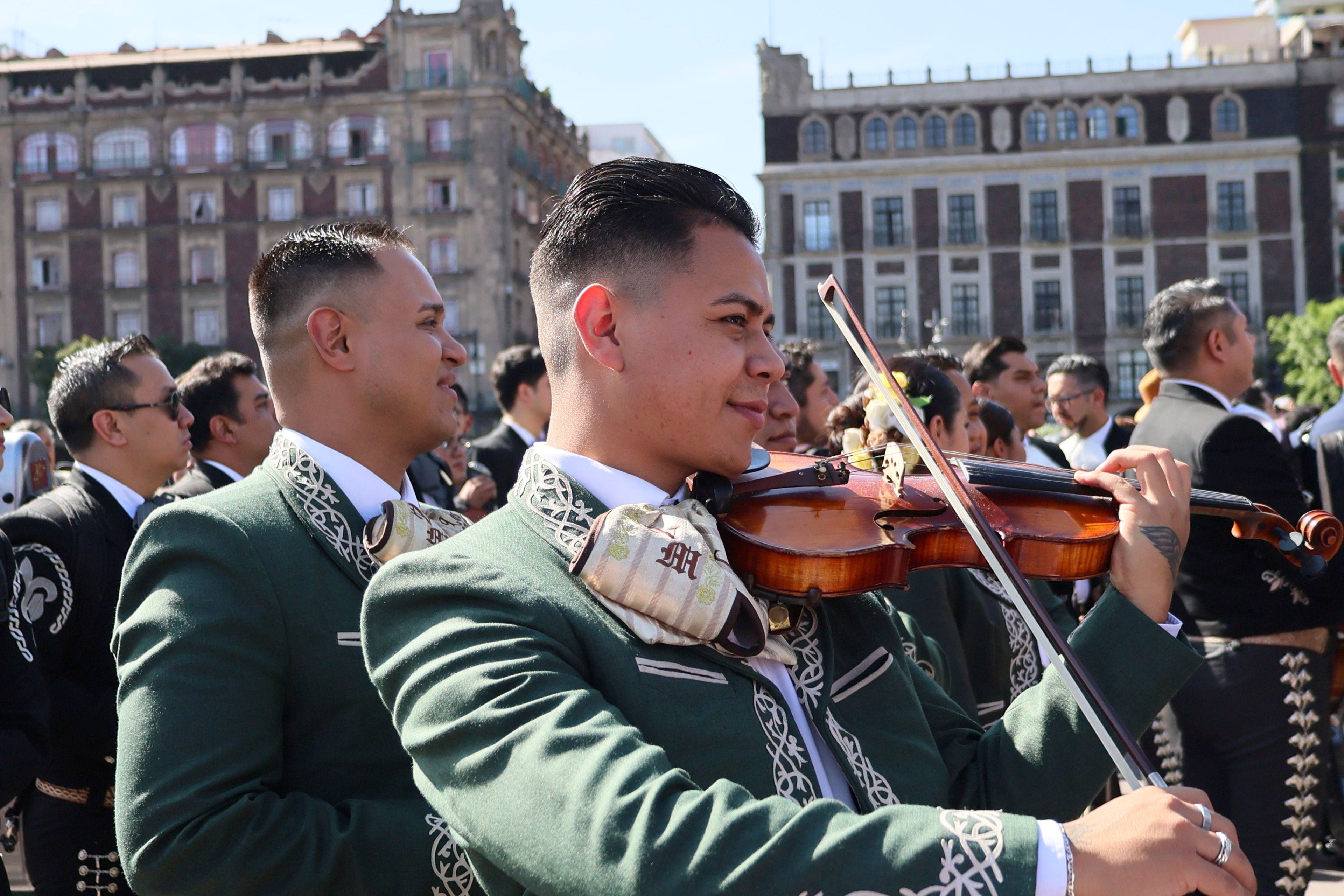 Musicians gather to break the record of most mariachis performing in unison, at the Zocalo, Mexico City's main square, Sunday, Nov. 10, 2024. (AP Photo/Ginnette Riquelme)