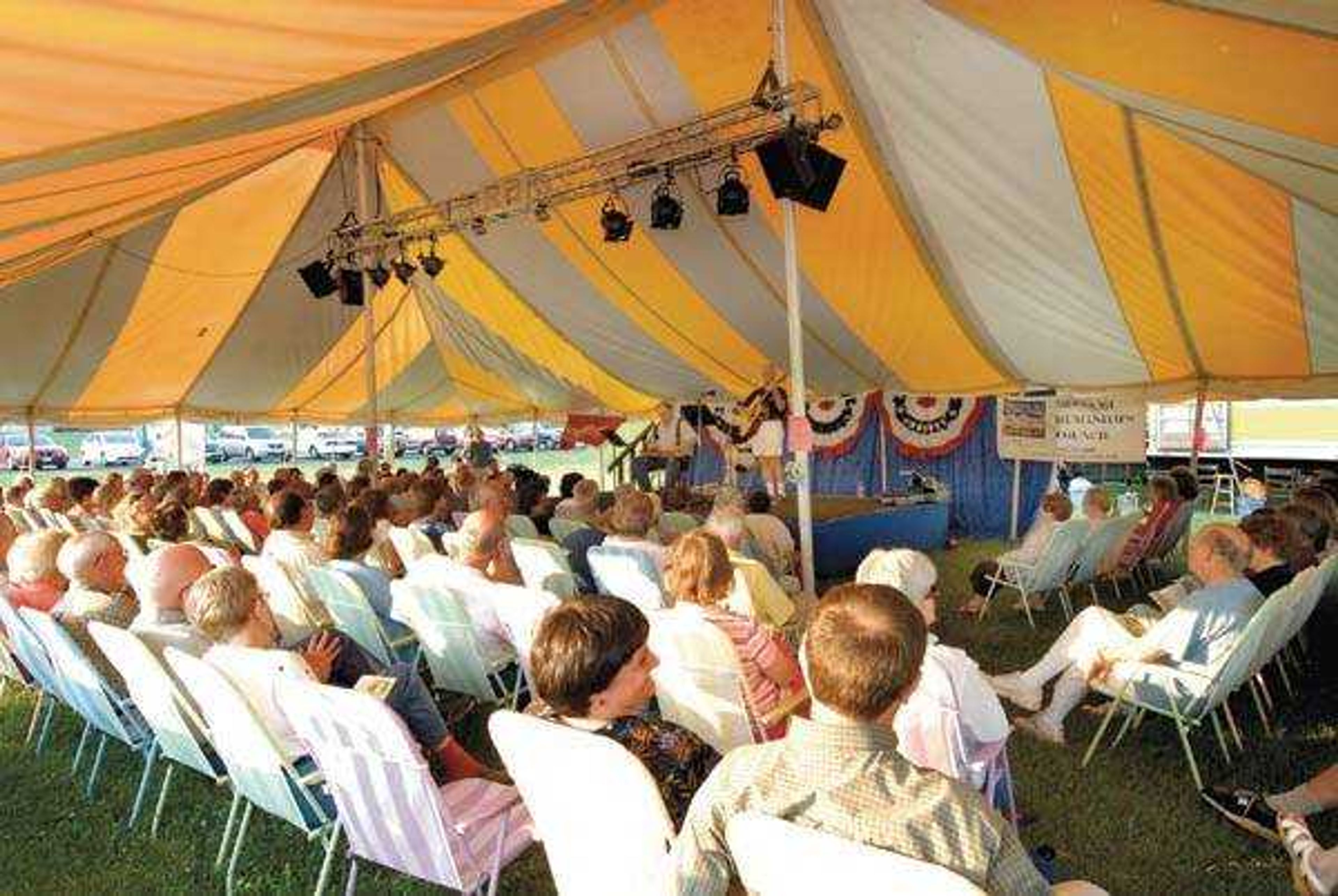 SATURDAY: With cooler temperatures and a full tent, the crowd enjoyed entertainment by the Vintage Strings.