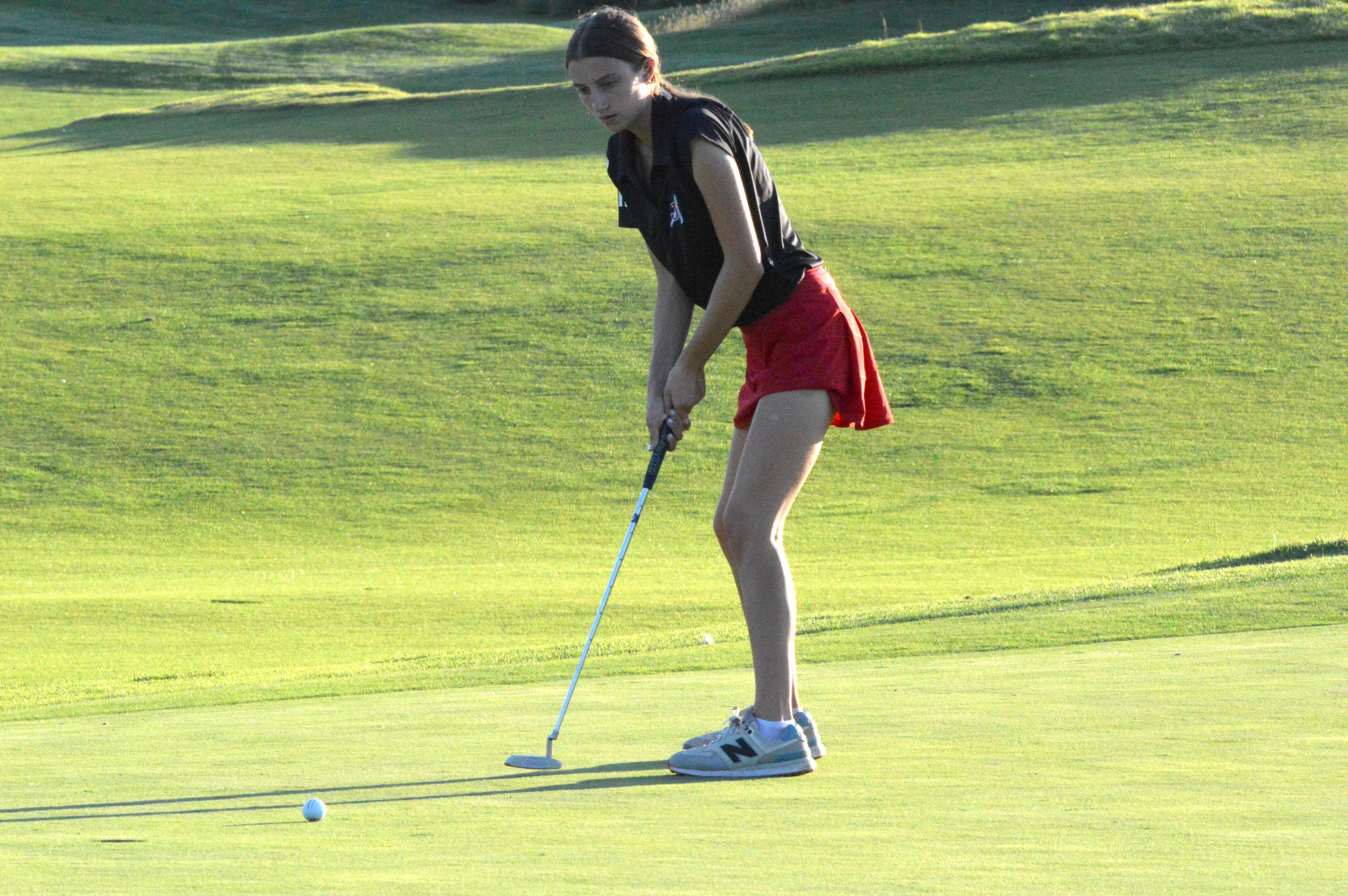 Jackson junior Ava Mooty putts the ball before the hole in the Notre Dame quad-meet on Thursday, Sept. 26. Mooty scored a 48 in the outing.