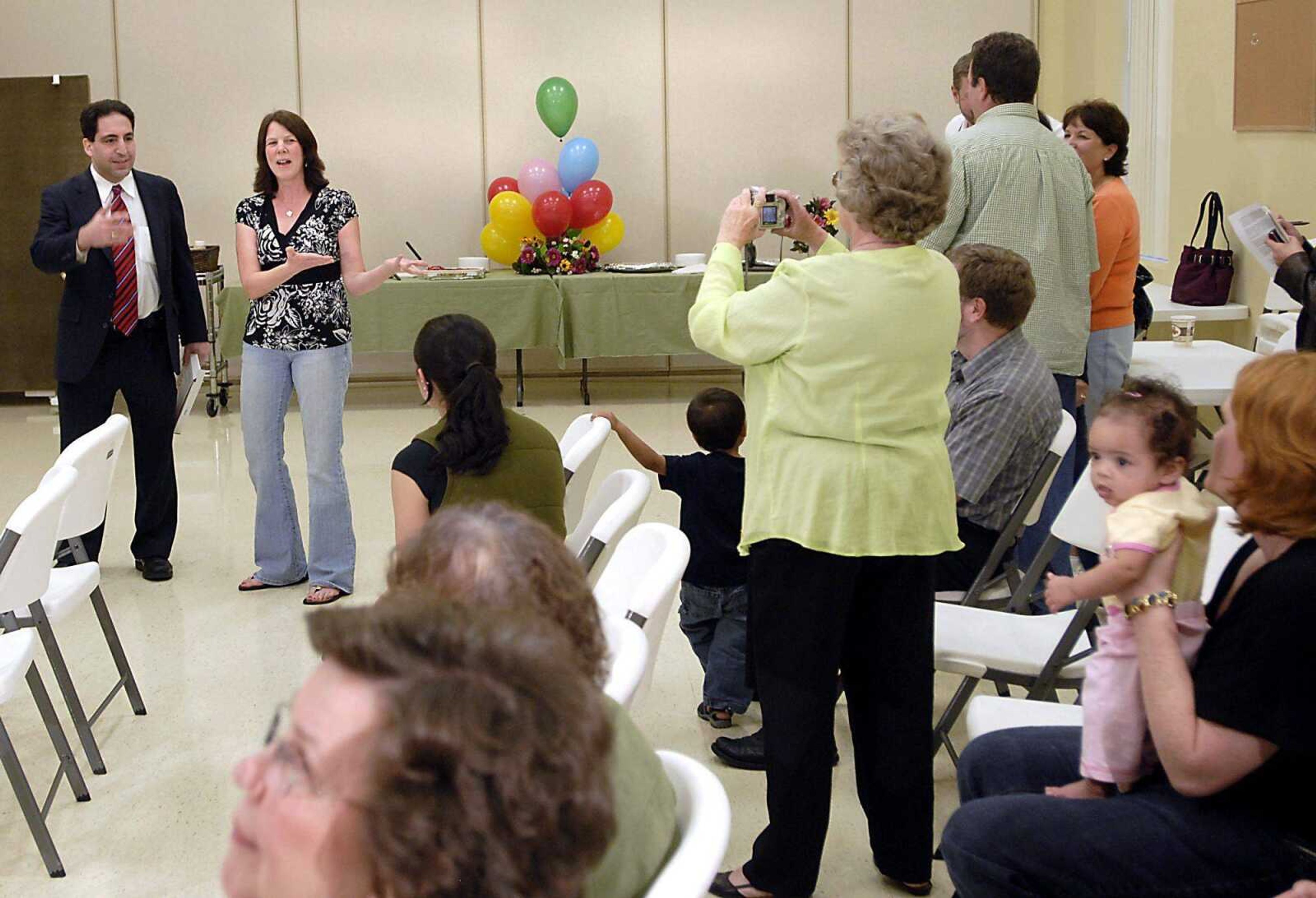 Tracy McClard reacts to the crowd of friends and family that surprised her Monday evening at CrossRoads Church in Jackson. McClard received the National Mother of Distinction Award. (Kit Doyle)