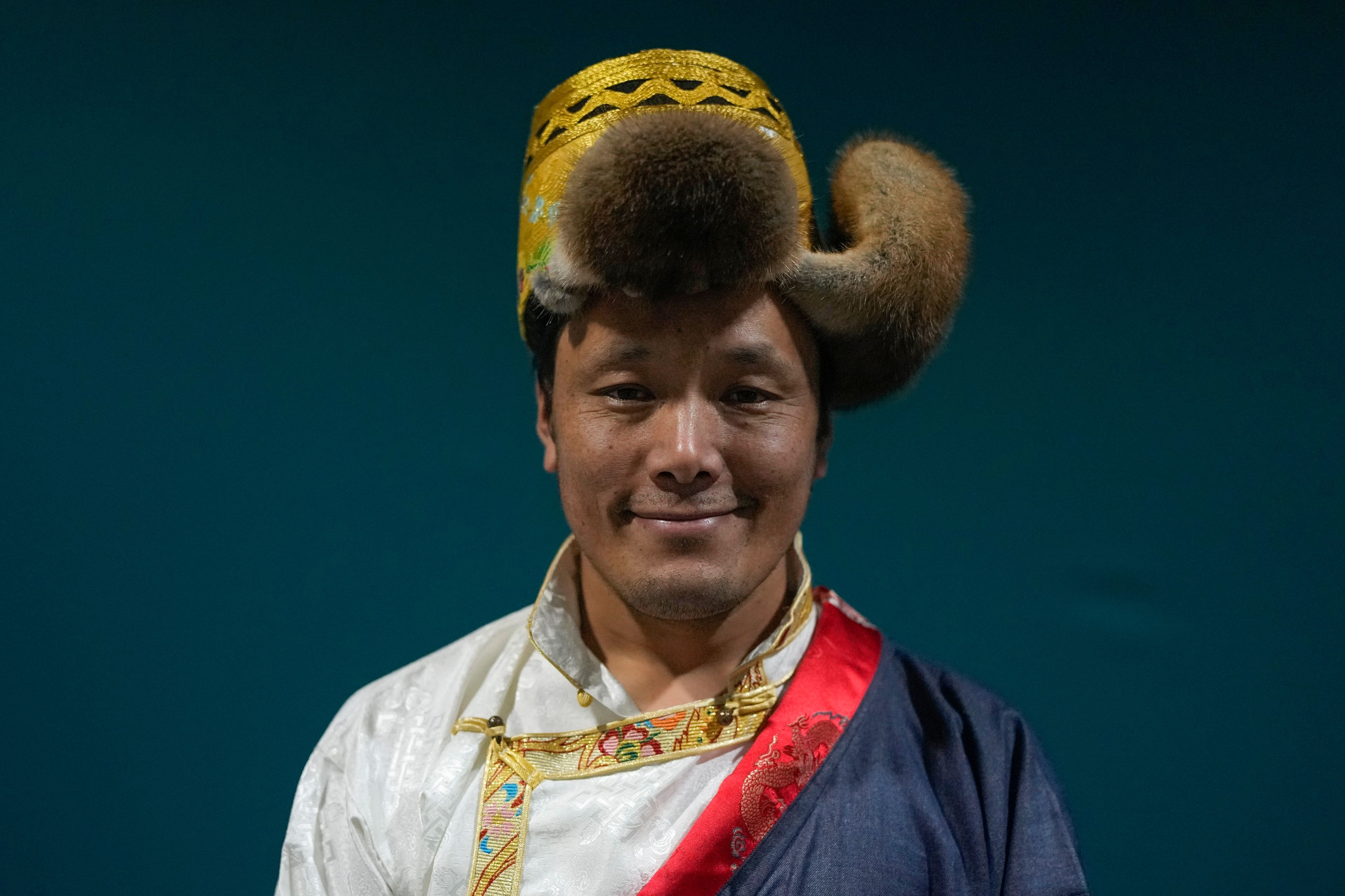 Mingma Chhiri, 40, of the Khumbu Pasanglhamu Municipality District, Nepal, from the Sherpa community, poses for a photo during the COP29 U.N. Climate Summit, Friday, Nov. 15, 2024, in Baku, Azerbaijan.(AP Photo/Rafiq Maqbool)