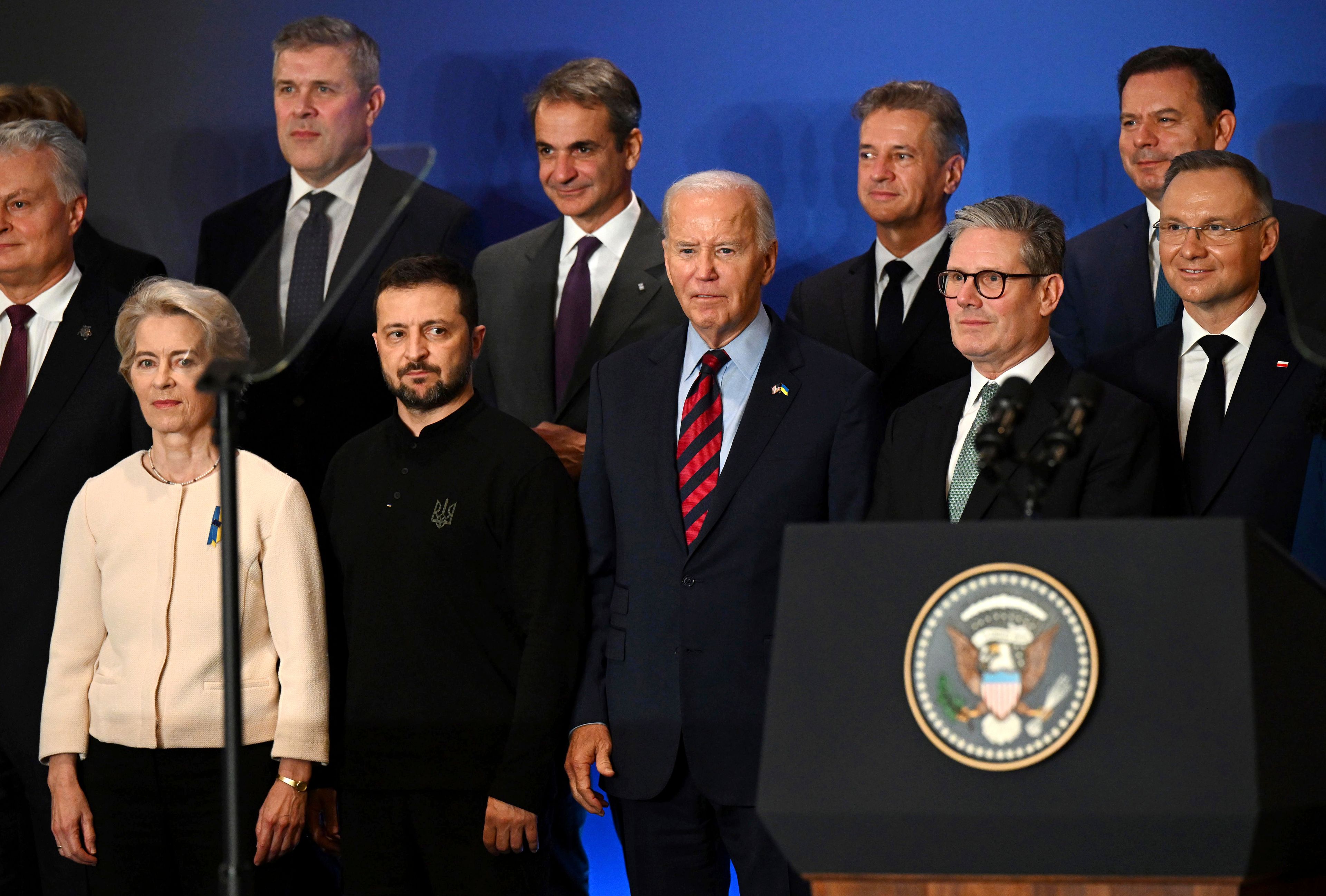 FILE - U.S. President Joe Biden, center, with Ukraine's President Volodymyr Zelenskyy, front second left, President of the European Commission Ursula von der Leyen, front left, Britain's Prime Minister Keir Starmer, front second right, President of Poland Andrzej Duda, right, and other world leaders pose for a family picture of the launching of a Joint Declaration of Support for Ukrainian Recovery and Reconstruction, on Sept. 25, 2024, in New York. (Leon Neal/Pool Photo via AP, File)