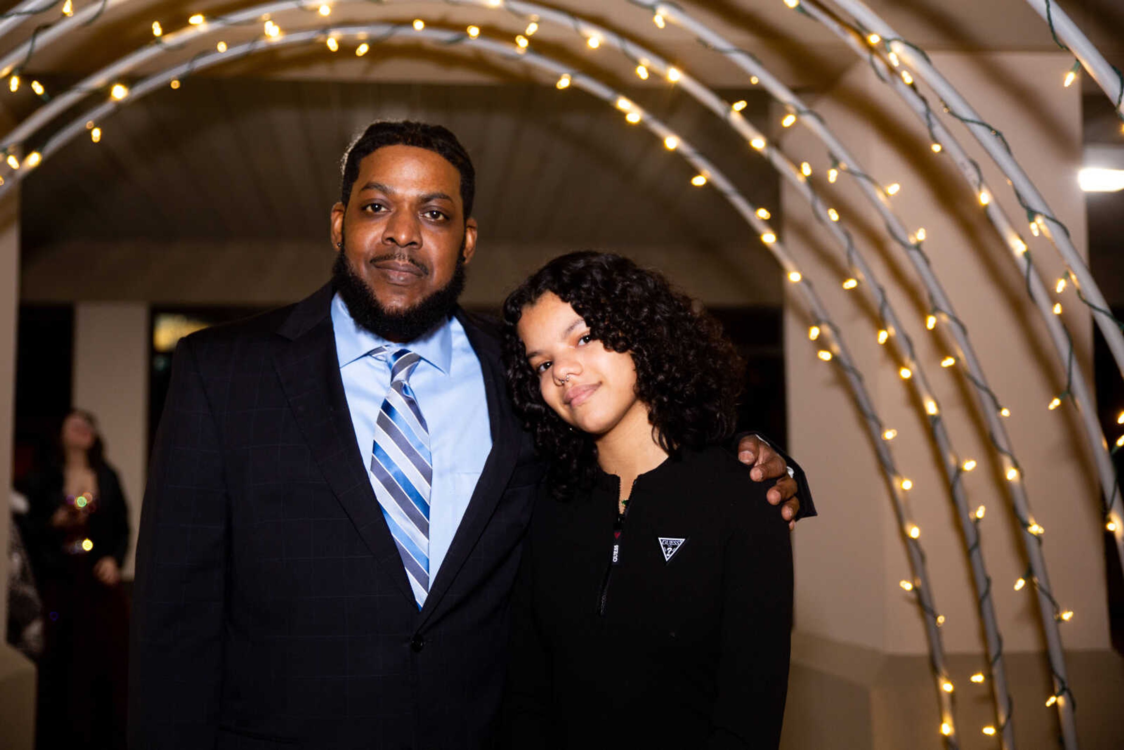 John Martin and daughter Miayanah Martin, 13, pose together at the dance.