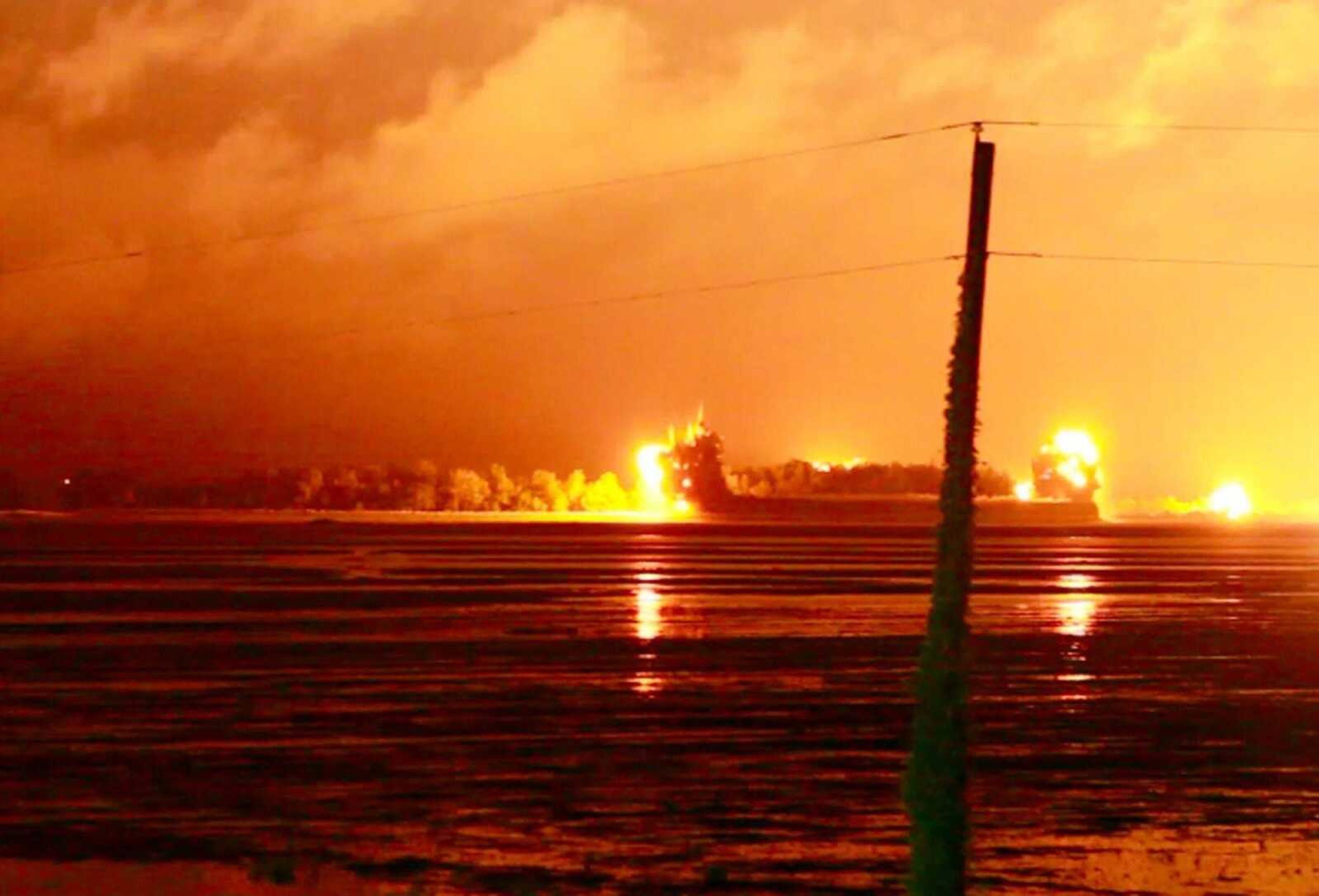 An explosion lights up the night sky as the U.S. Army Corps of Engineers blows an 11,000 foot hole in the Birds Point levee in Mississippi County, Mo. on Monday, May 2, 2011. Army Corps of Engineers' Maj. Gen. Michael Walsh gave the order to blow a two-mile hole into the Birds Point levee in southeast Missouri, which will flood 130,000 acres of farmland in Missouri's Mississippi County but protect nearby Cairo, Ill. (AP Photo/St. Louis Post-Dispatch, David Carson)