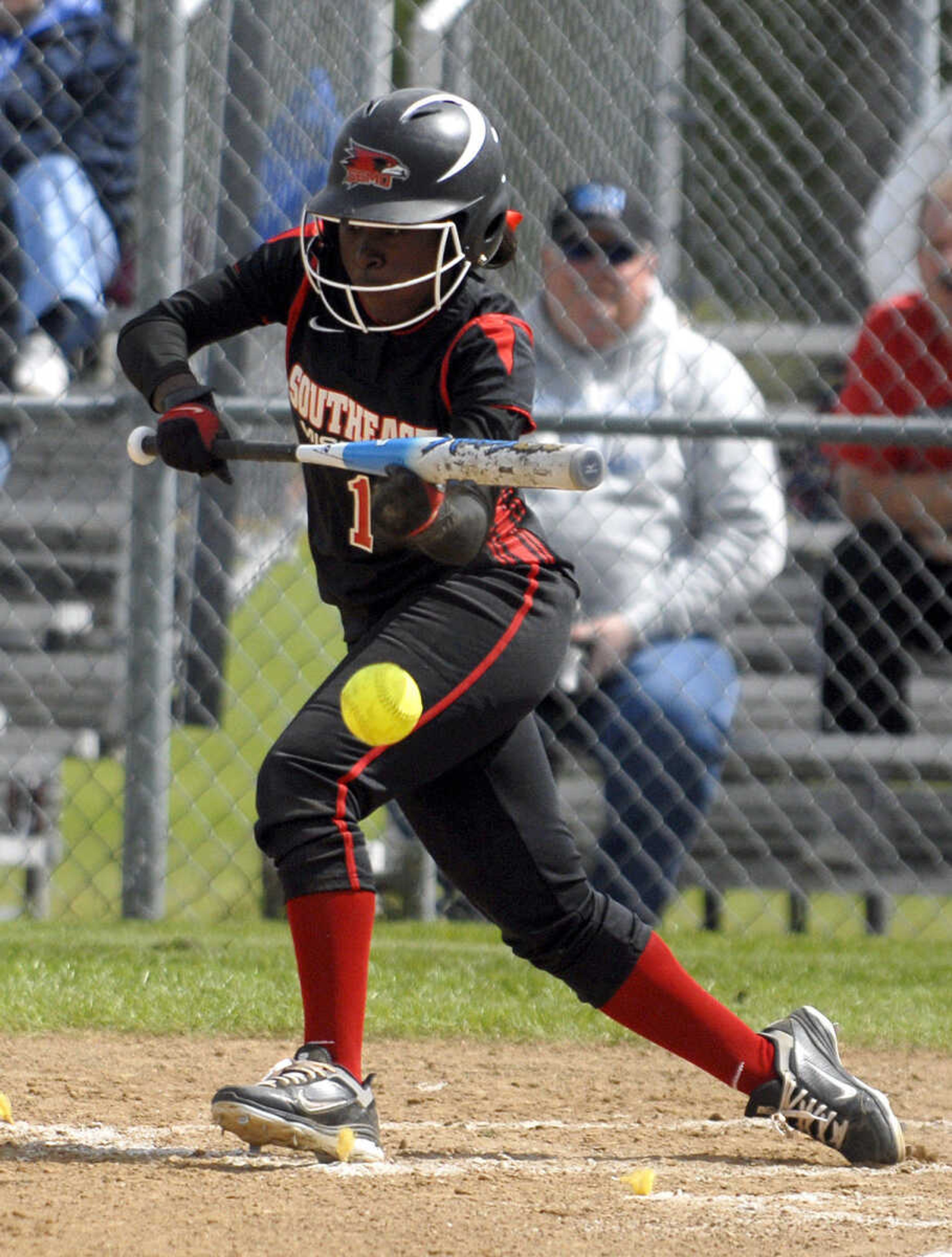 LAURA SIMON~lsimon@semissourian.com
Southeast batter Evan Sallis bunts in the second inning of the first game of a double-header against Saint Louis University Wednesday, May 4, 2011 at the Southeast Softball Complex.