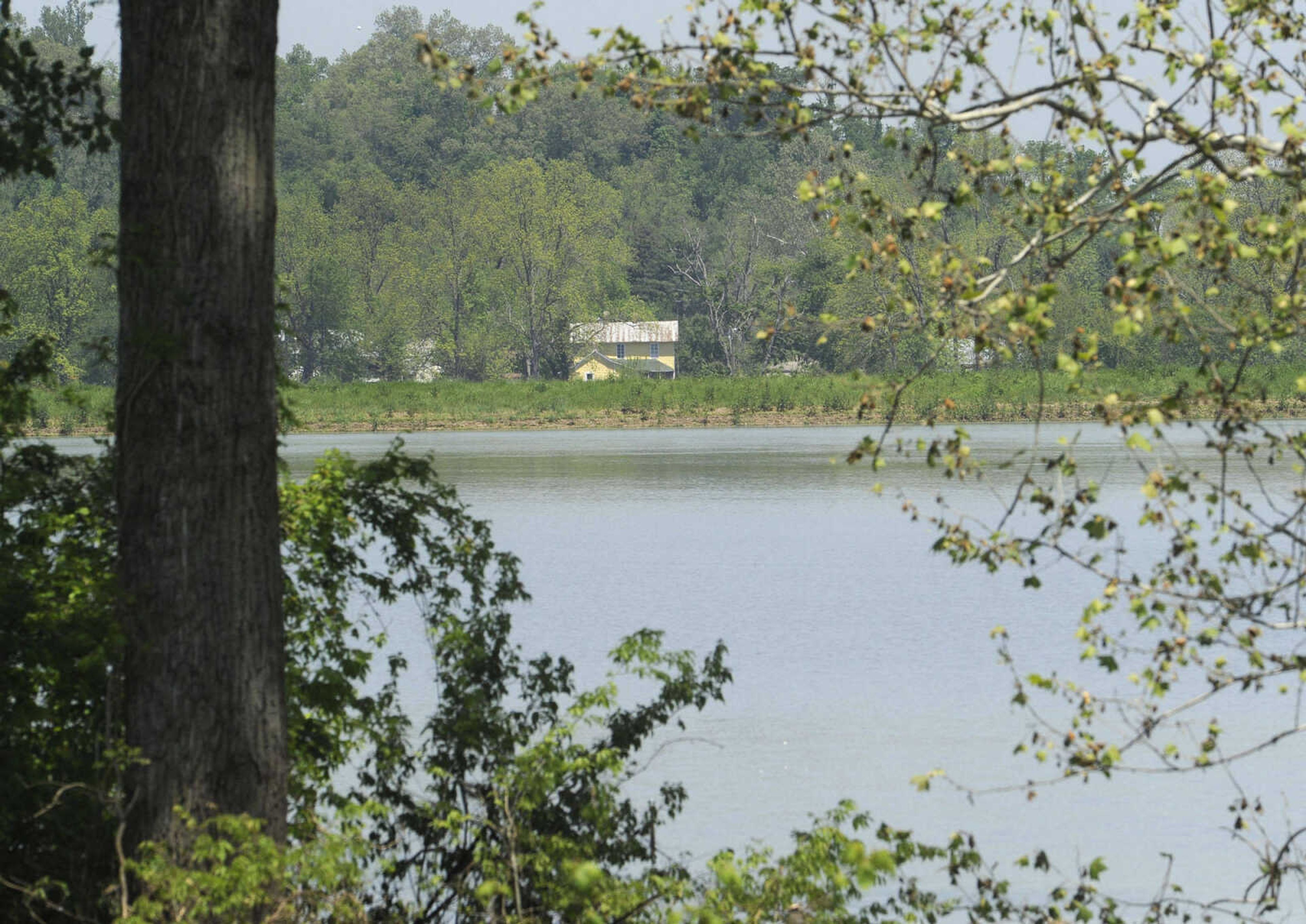 FRED LYNCH ~ flynch@semissourian.com
This view from the federal levee looking north to the town Sunday, May 8, 2011 shows the flooded fields that were caused by a breached farm levee south of Commerce, Mo.