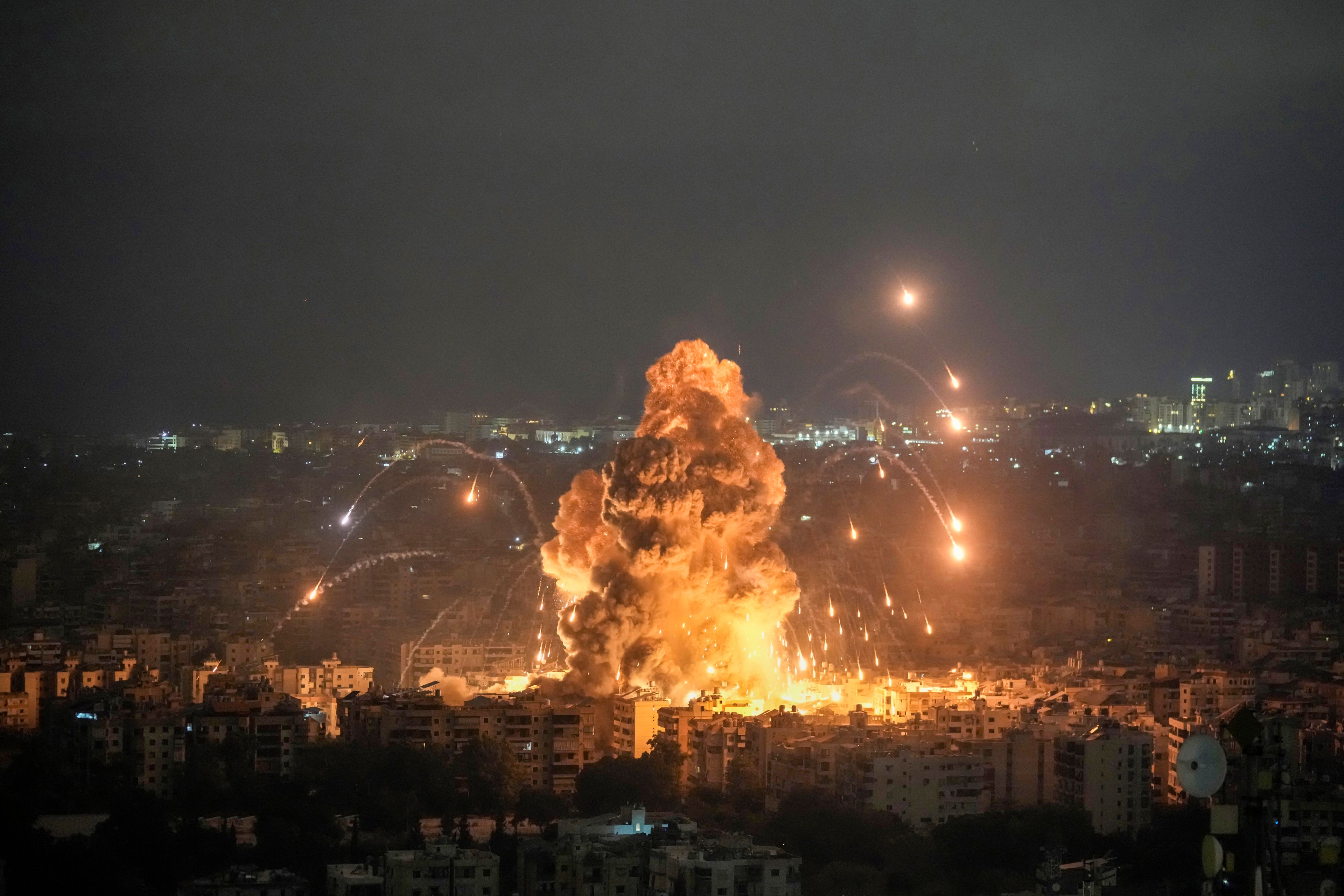 File - Flames and smoke rise from an Israeli airstrike in the southern suburbs of Beirut, Lebanon, Sunday, Oct. 6, 2024. (AP Photo/Bilal Hussein, File)