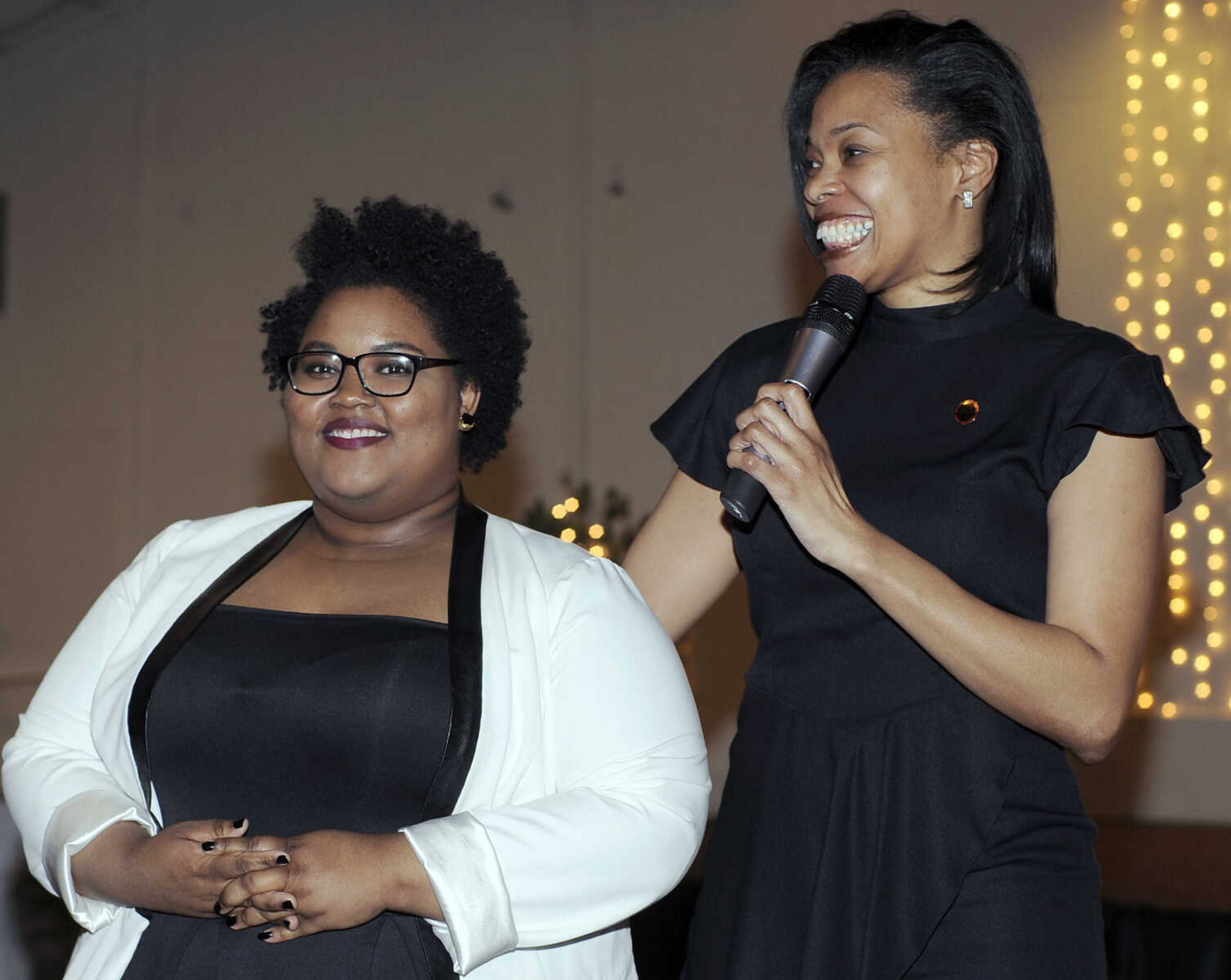 FRED LYNCH ~ flynch@semissourian.com
Tameka Randle, right, presents Kayla Turner as the recipient of the NAACP scholarship Saturday, Feb. 17, 2018 at the NAACP 2018 Freedom Fund Dinner at Ray's Plaza Banquet Center.