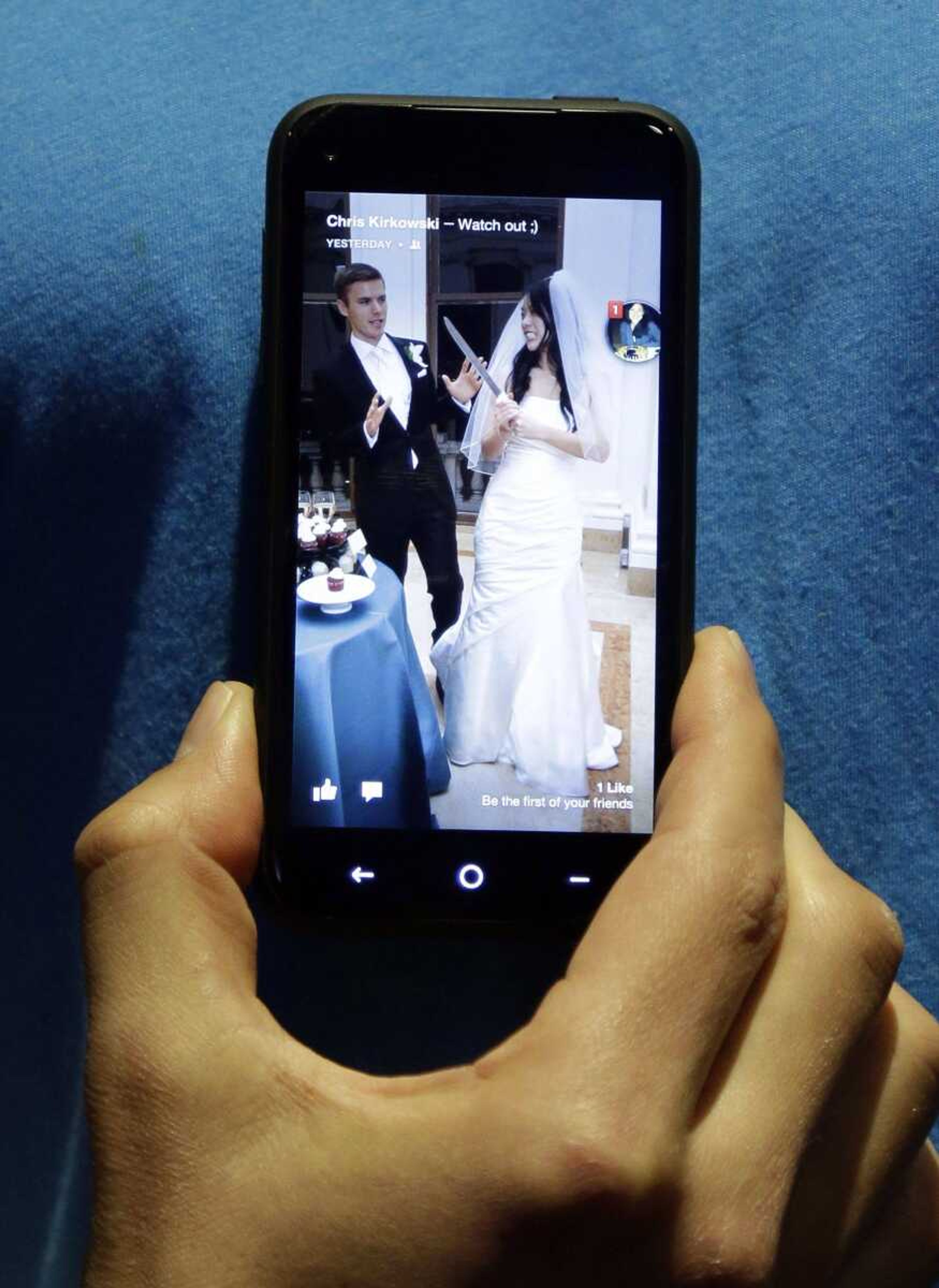 The HTC First phone with the new Facebook interface is shown at the Facebook Headquarters on April 4 in Menlo Park, Calif. (Marcio Jose Sanchez ~ Associated Press)