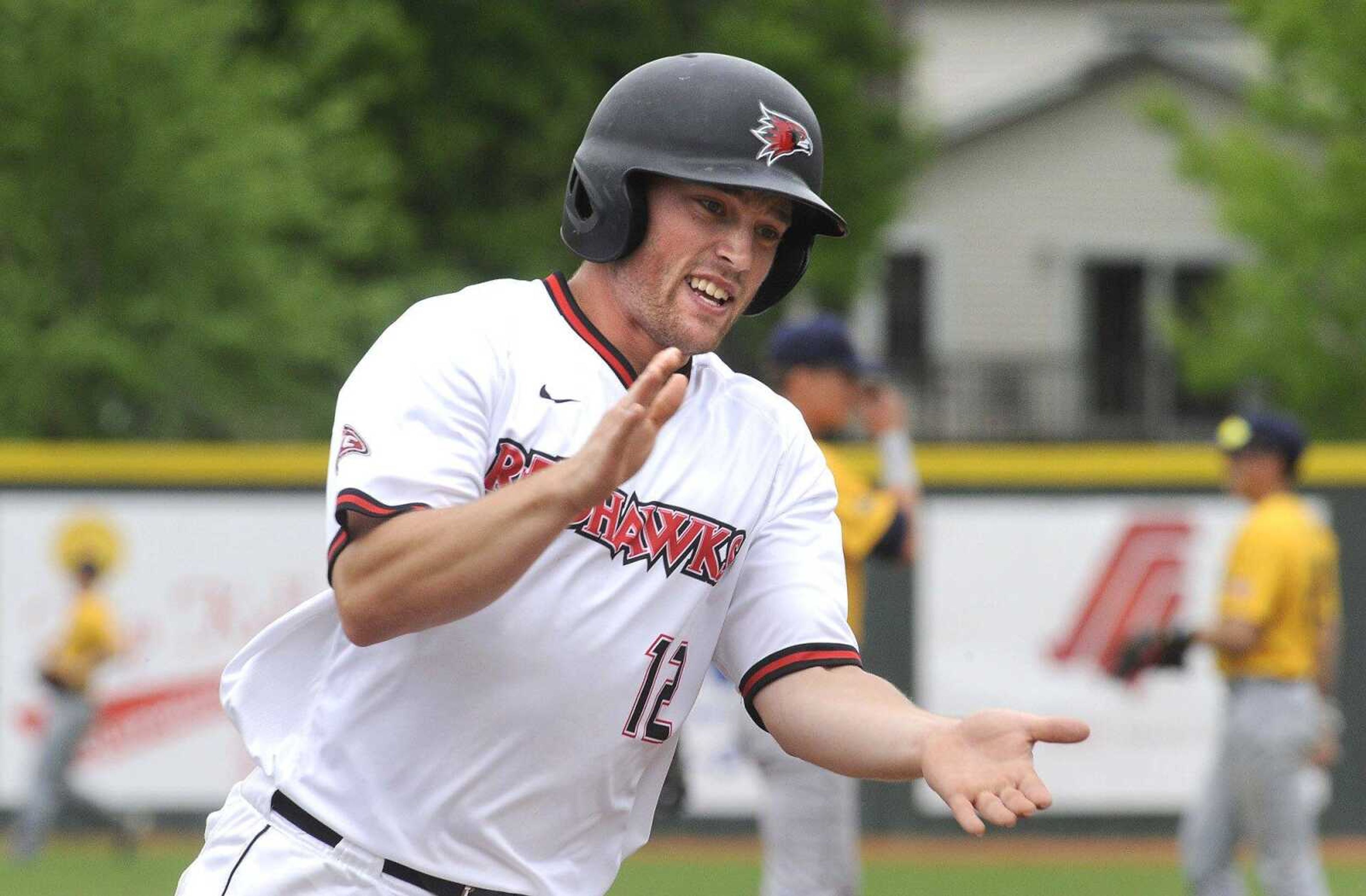 Southeast Missouri State's Trevor Ezell rounds third base to score on a home run by Dan Holst against Murray State during the second inning Saturday, April 30, 2016 at Capaha Field.