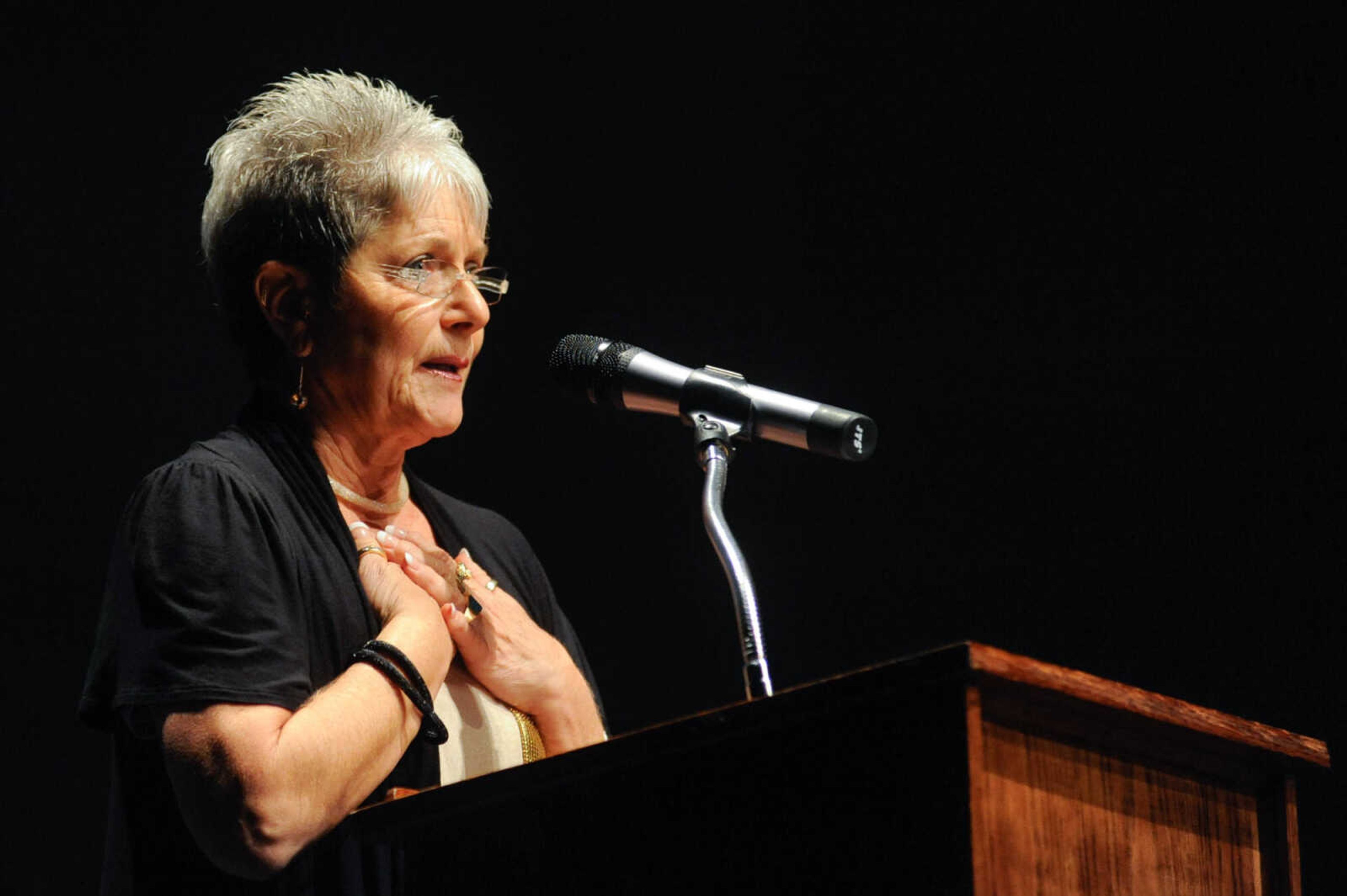 GLENN LANDBERG ~ glandberg@semissourian.com


Sharon Carlquist delivers a personal speech to the crowd during the VintageNOW fashion show at the Osage Centre on Saturday, October 24, 2015. Proceeds benefited the Safe House for Women.