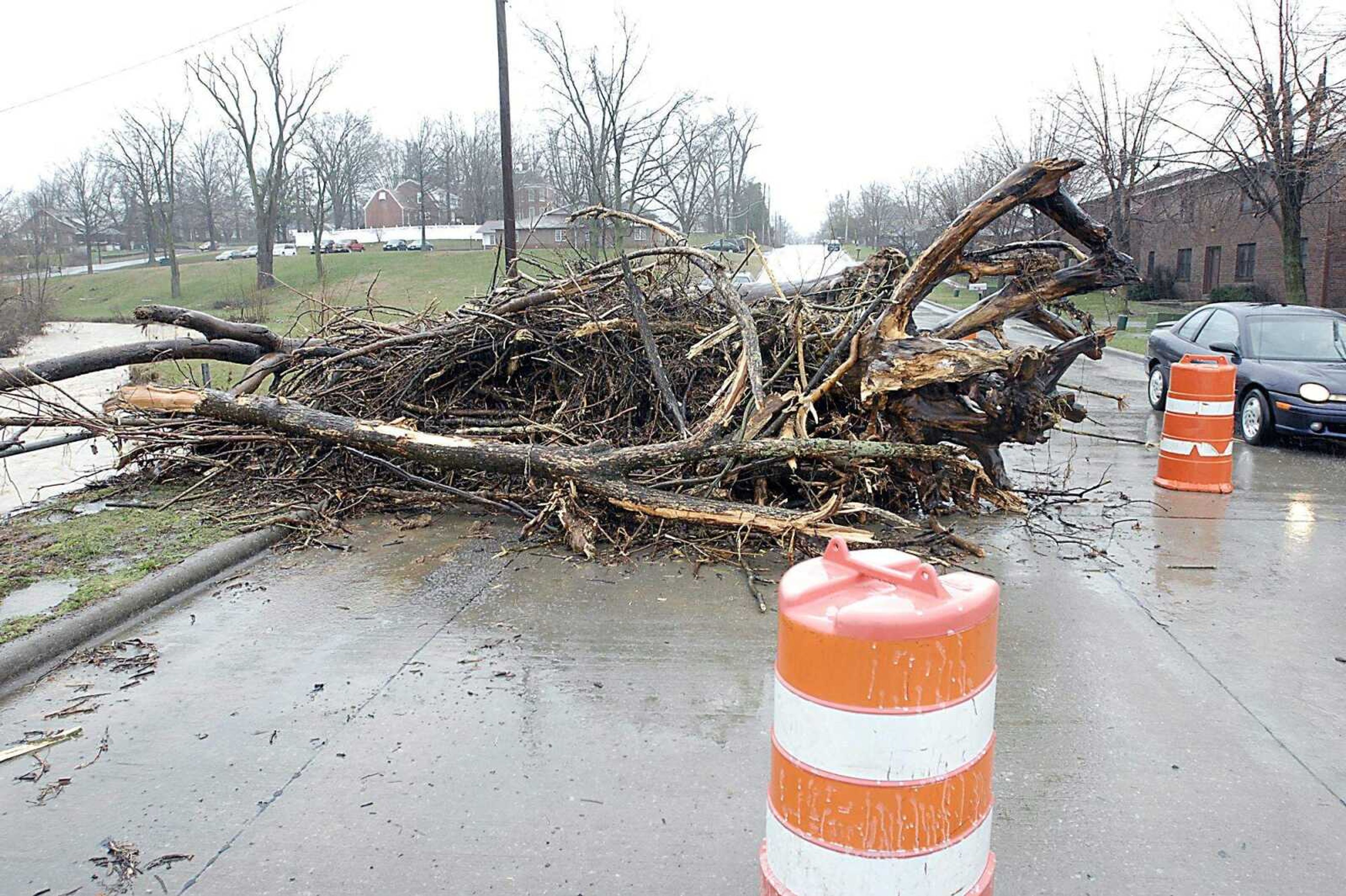 KIT DOYLE ~ kdoyle@semissourian.com
Debris sat atop a bridge on E. Adams St. Tuesday, March 18, 2008 in Jackson. Some fear that flood waters will sweep away debris from several February ice storms and cause more problems backing up over drains and in front of bridges.