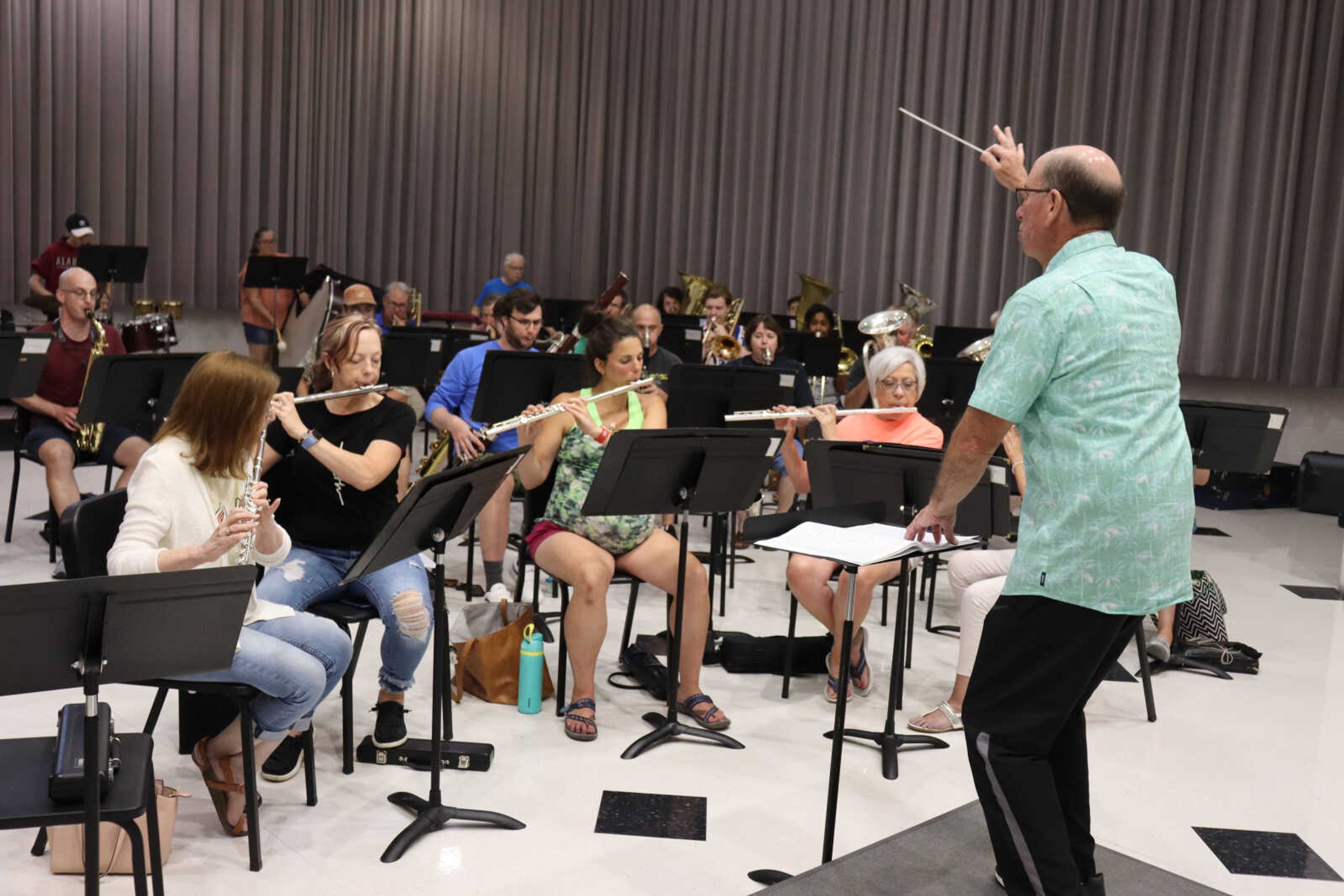 Scott VanGilder directs the Jackson Municipal Band through the music on Tuesday.