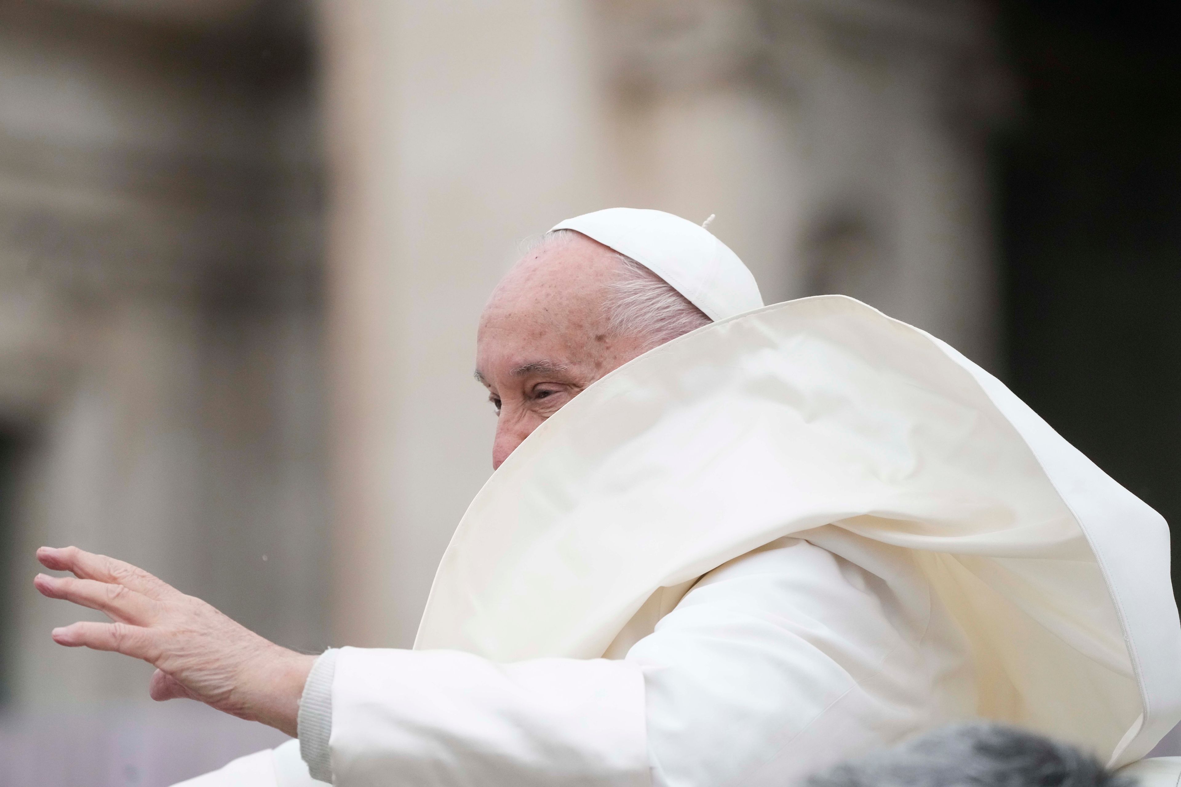 Pope Francis waves as he leaves after his weekly general audience in St. Peter's Square at The Vatican, Wednesday, Nov.20, 2024. (AP Photo/Gregorio Borgia)