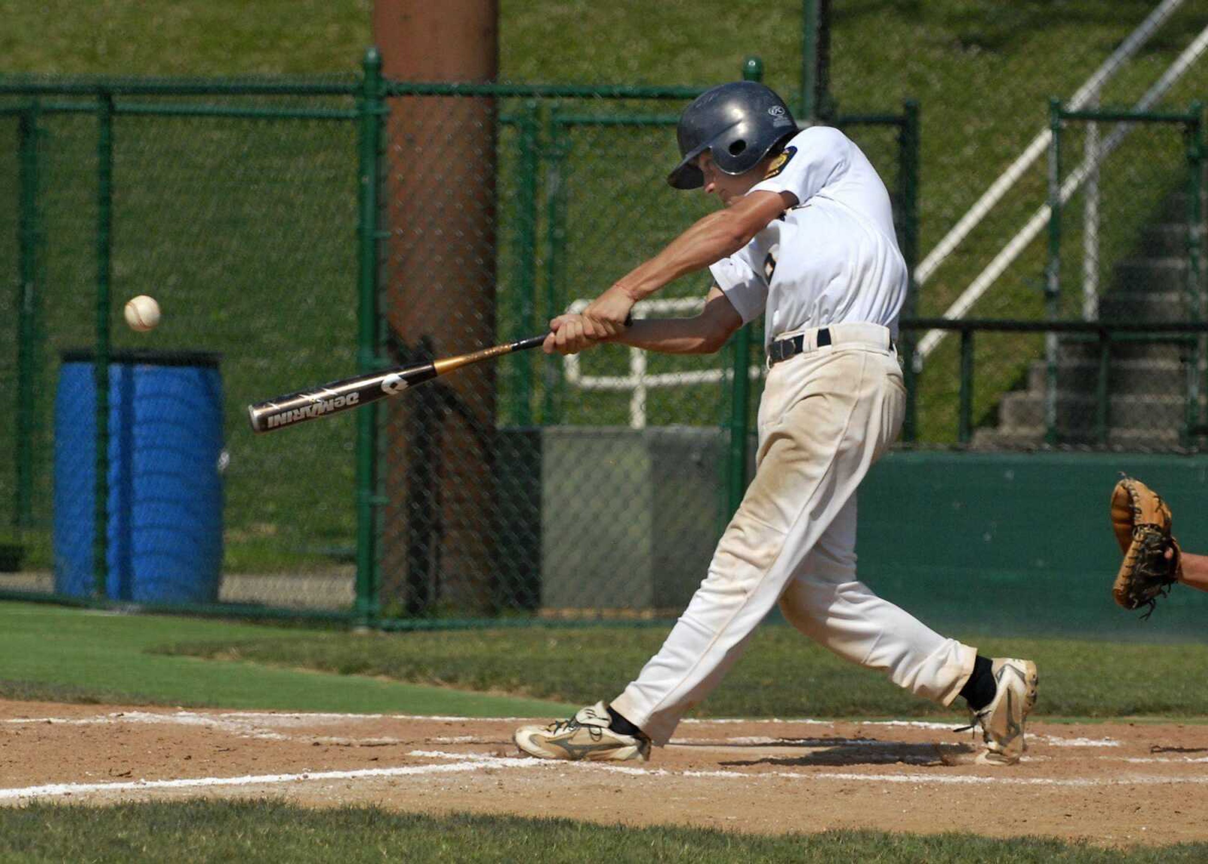 Post 63's Jimmy Obermark hits a two-run double against Tri-County during the second inning Wednesday at Capaha Field. (KRISTIN EBERTS ~ kebertssemissourian.com)