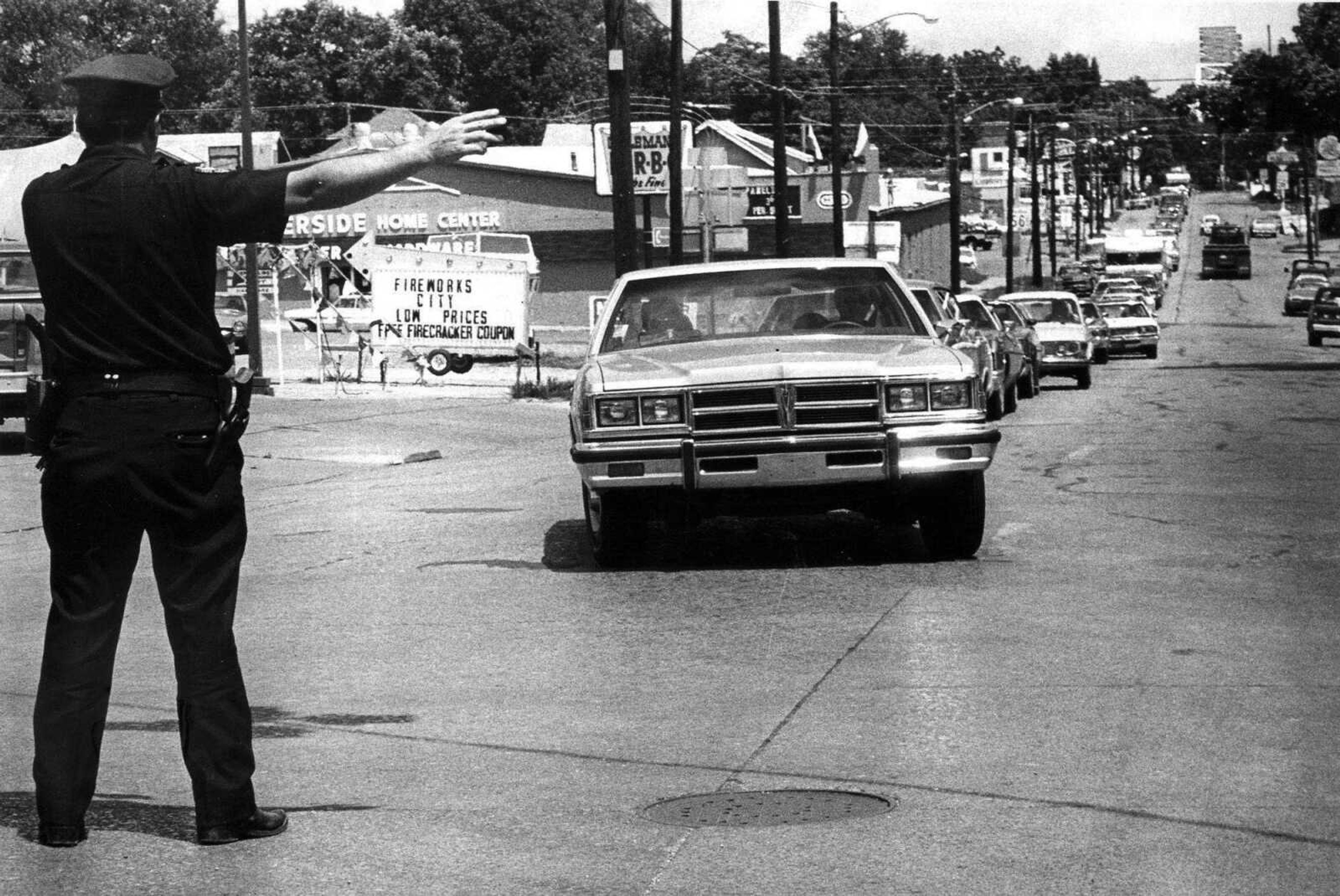 SOUTHEAST MISSOURIAN ~ photos@semissourian.com
July 2, 1977
Patrolman A.C. Moore with the Cape Girardeau police department directs traffic on Sprigg Street and Morgan Oak.