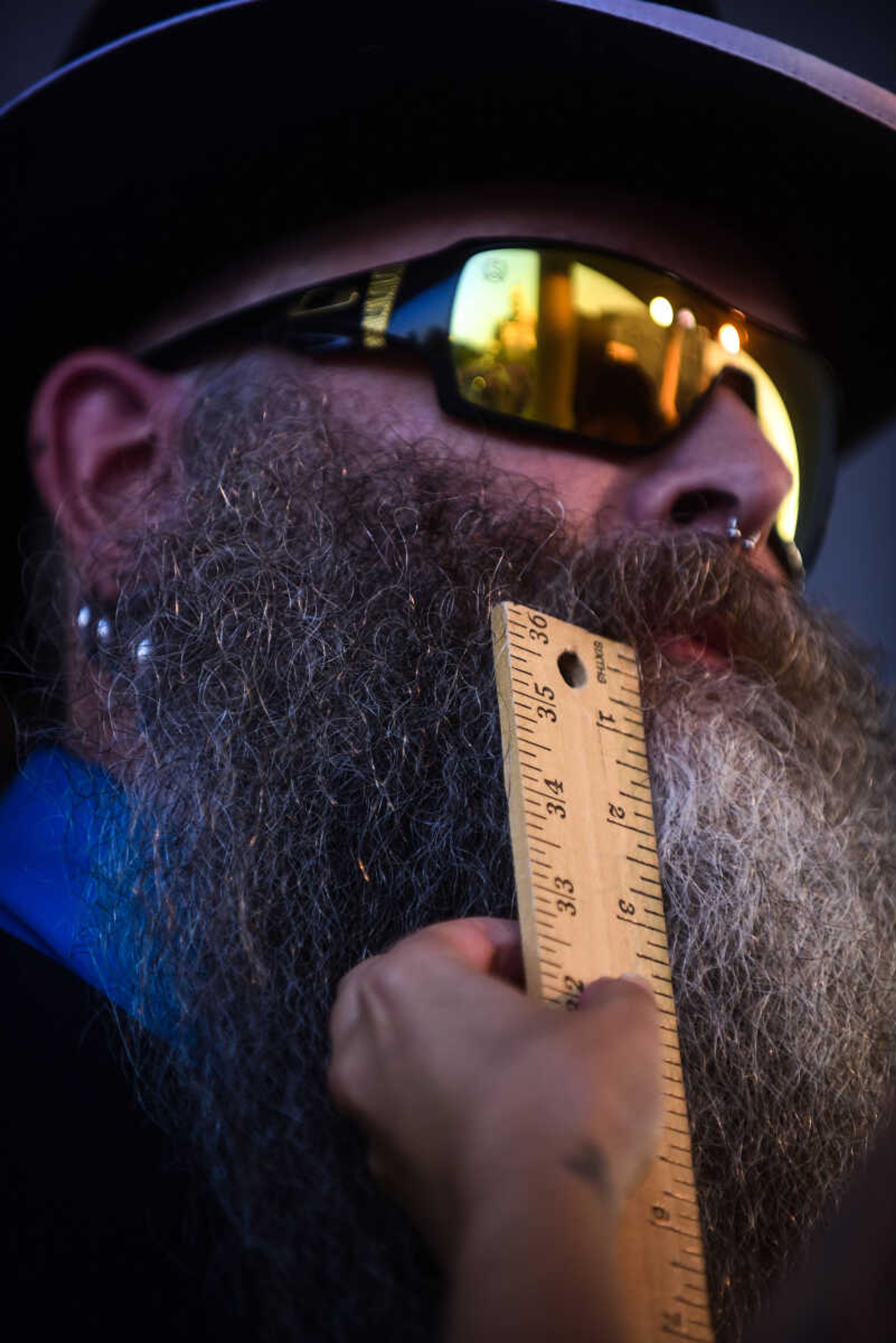 Mike Coleman has his beard measured during the Perryville Pinup contest Saturday, Sept. 2, 2017 in downtown Perryville.