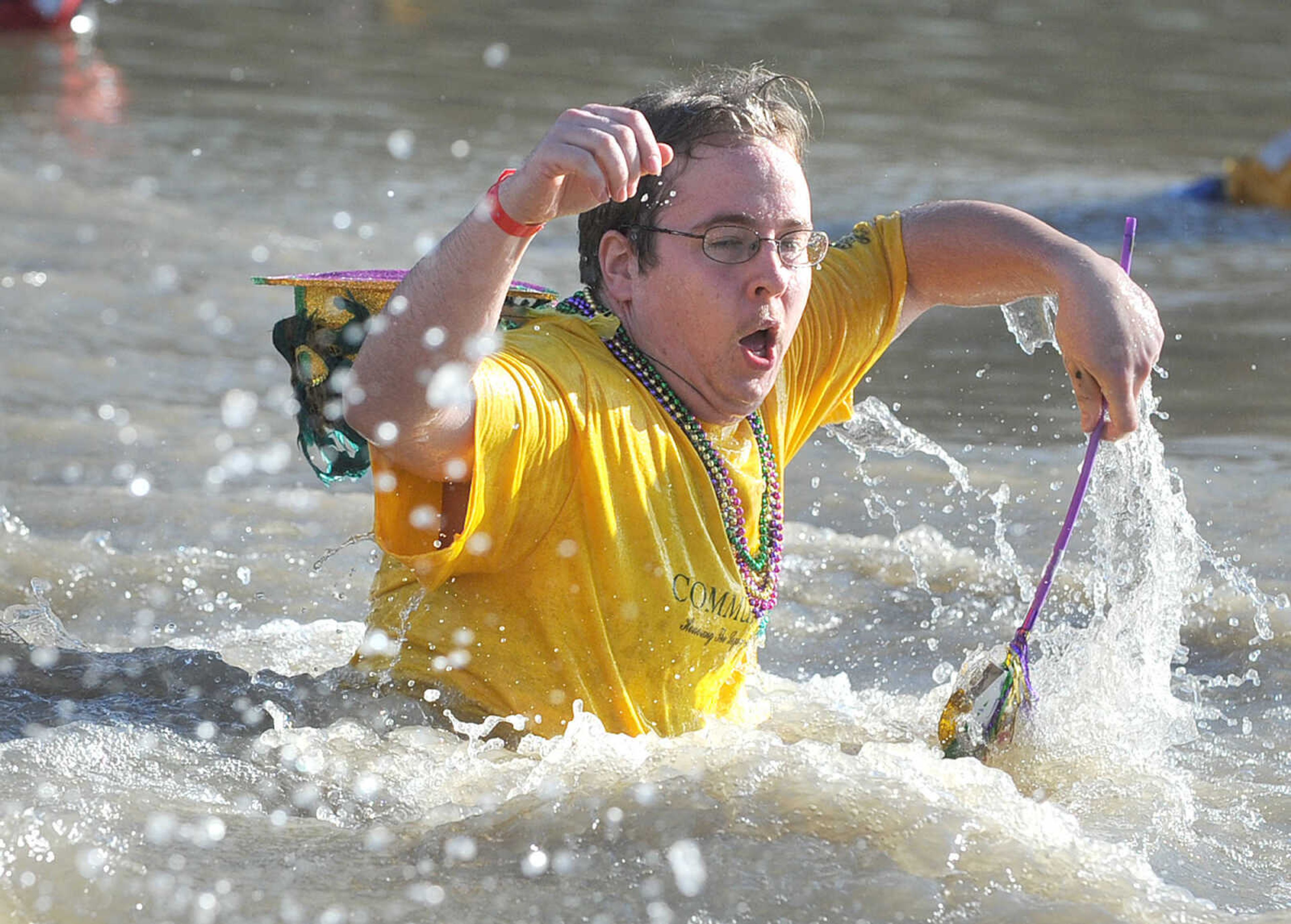 LAURA SIMON ~ lsimon@semissourian.com
People plunge into the cold waters of Lake Boutin Saturday afternoon, Feb. 2, 2013 during the Polar Plunge at Trail of Tears State Park. The lake's water temperature Saturday was 28 degrees. Thirty-six teams totaling 291 people took the annual plunge that benefits Special Olympics. Each team has to raise a minimum of 75 dollars to participate.