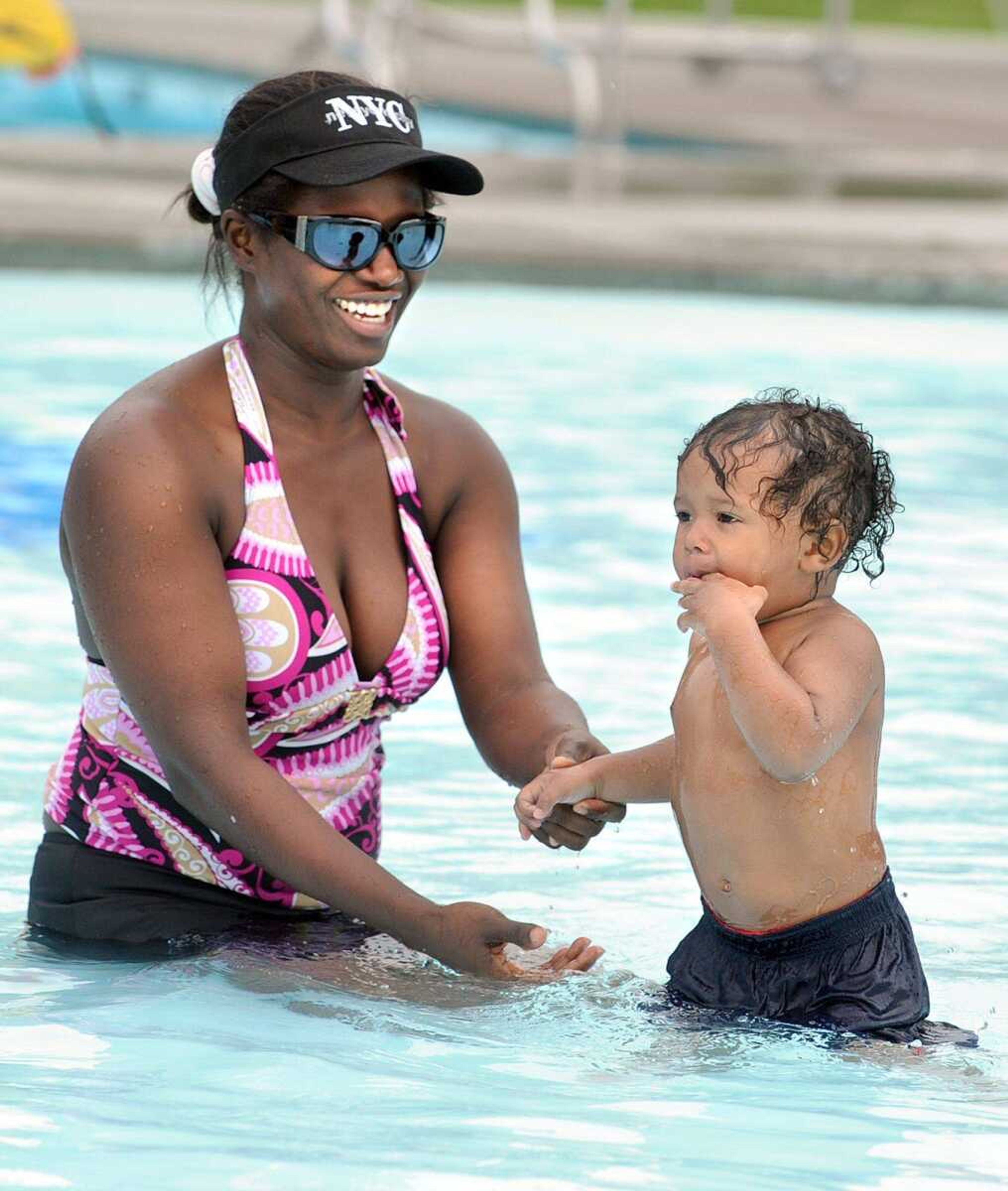 Delilah Lintner of Dyersburg, Tenn., and 18-month-old Jameson play in the leisure pool at Cape Splash Monday, Sept. 3, 2012, in Cape Girardeau. Monday was the last day of the season for the water park. (Laura Simon)