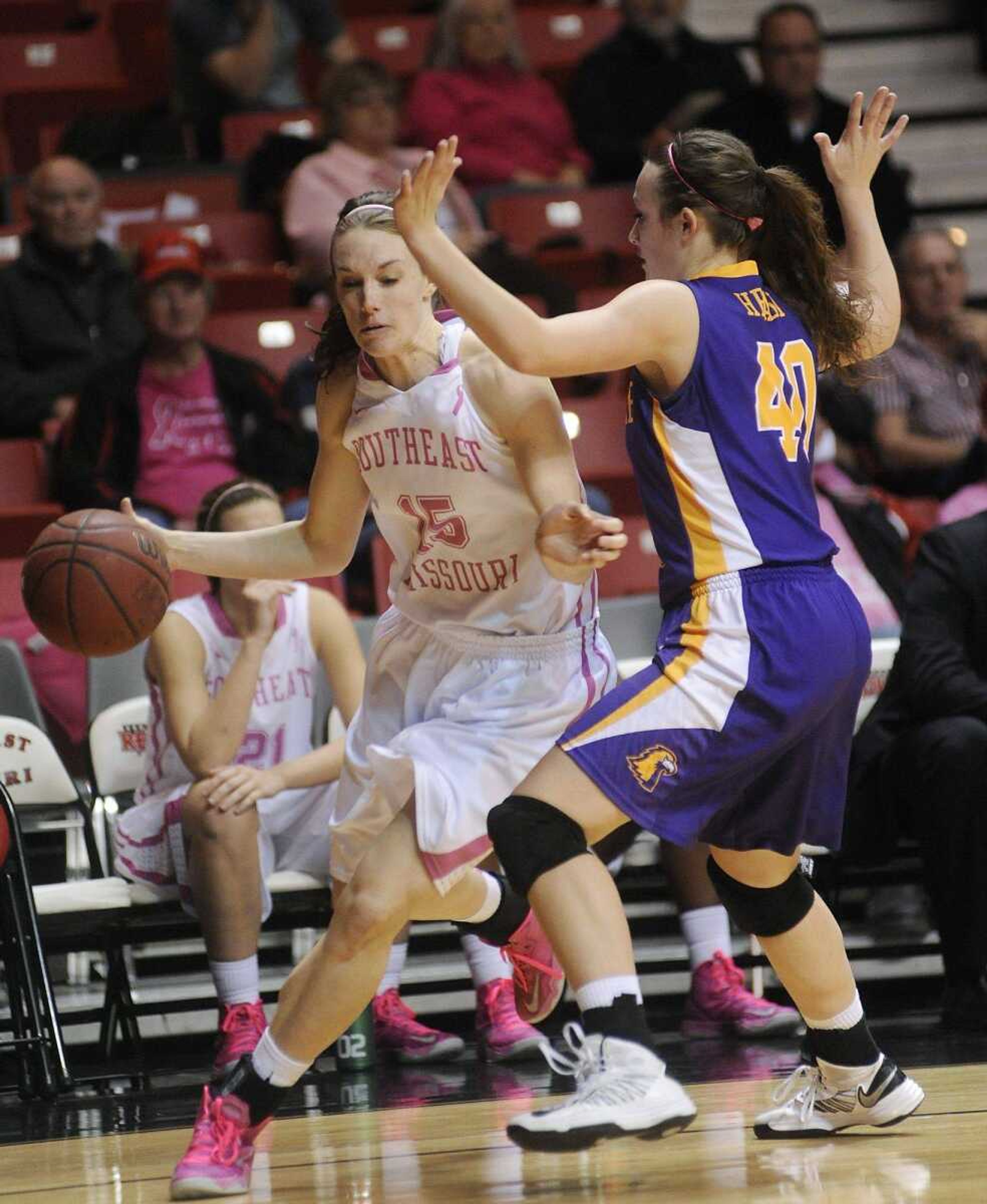 Southeast Missouri State&#8217;s Courtney Shiffer tries to get past Tennessee Tech forward Molly Heady during the Redhawks&#8217; 64-51 loss to the Golden Eagles Monday at the Show Me Center. (ADAM VOGLER)