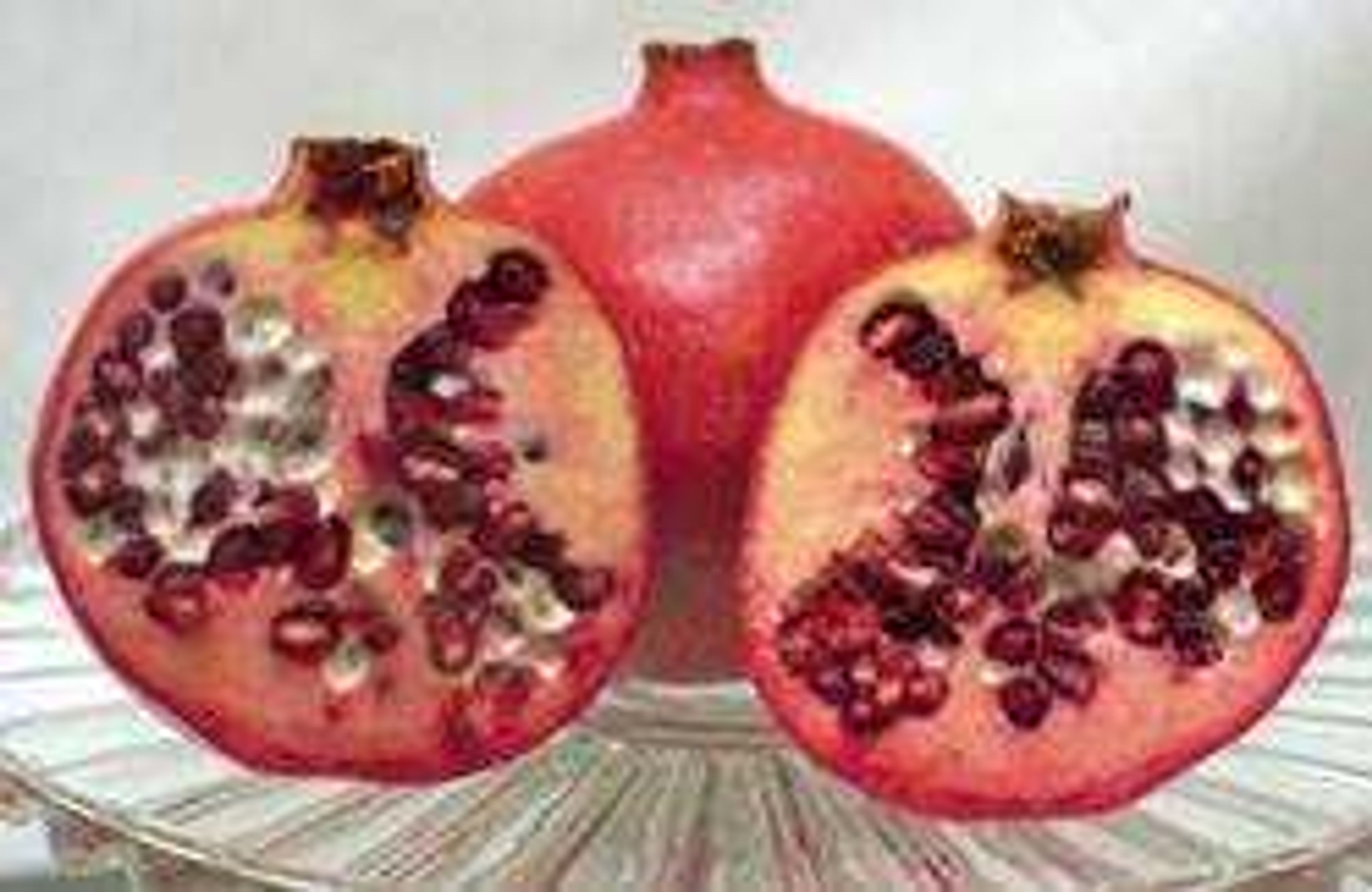 Hundreds of jewel-like red seeds distinguish a pomegranate as a fruit that is labor-intensive to eat. (Fred Lynch)