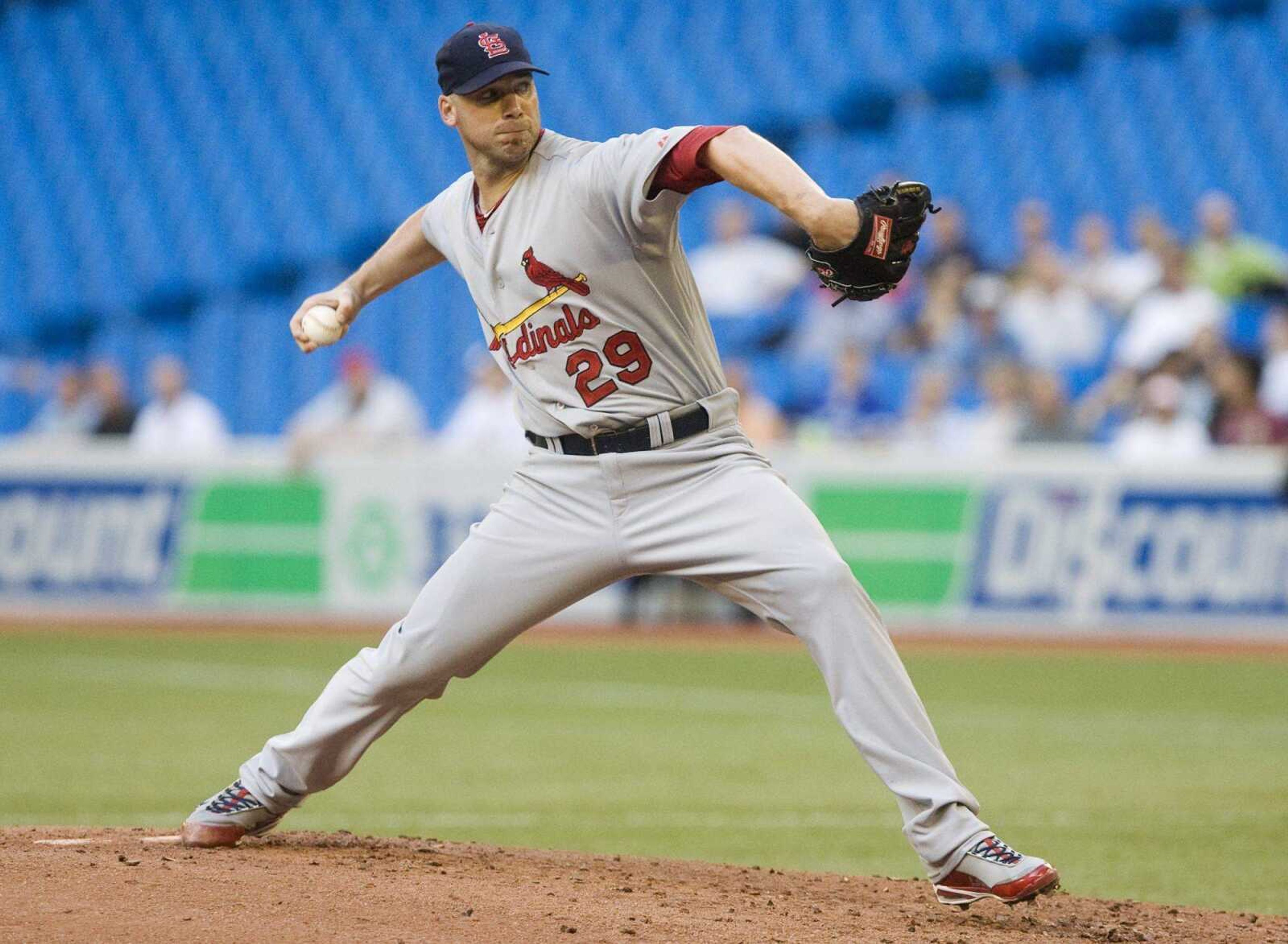 Cardinals pitcher Chris Carpenter works against the Blue Jays during the first inning Wednesday in Toronto. (DARREN CALABRESE ~ Canadian Press)