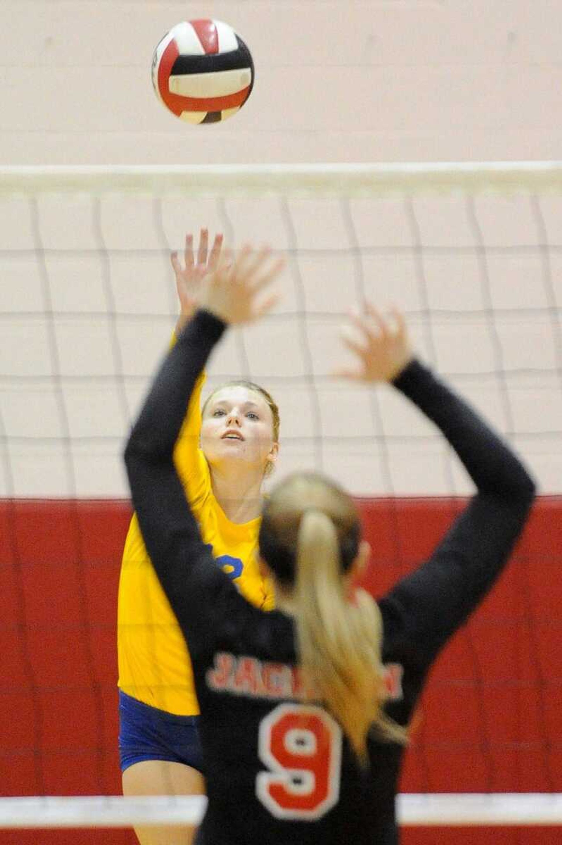 St. Vincent's Katie Verseman hits the ball to Jackson's Lexi King in the first set Tuesday, Aug. 25, 2015 in Jackson. (Glenn Landberg)