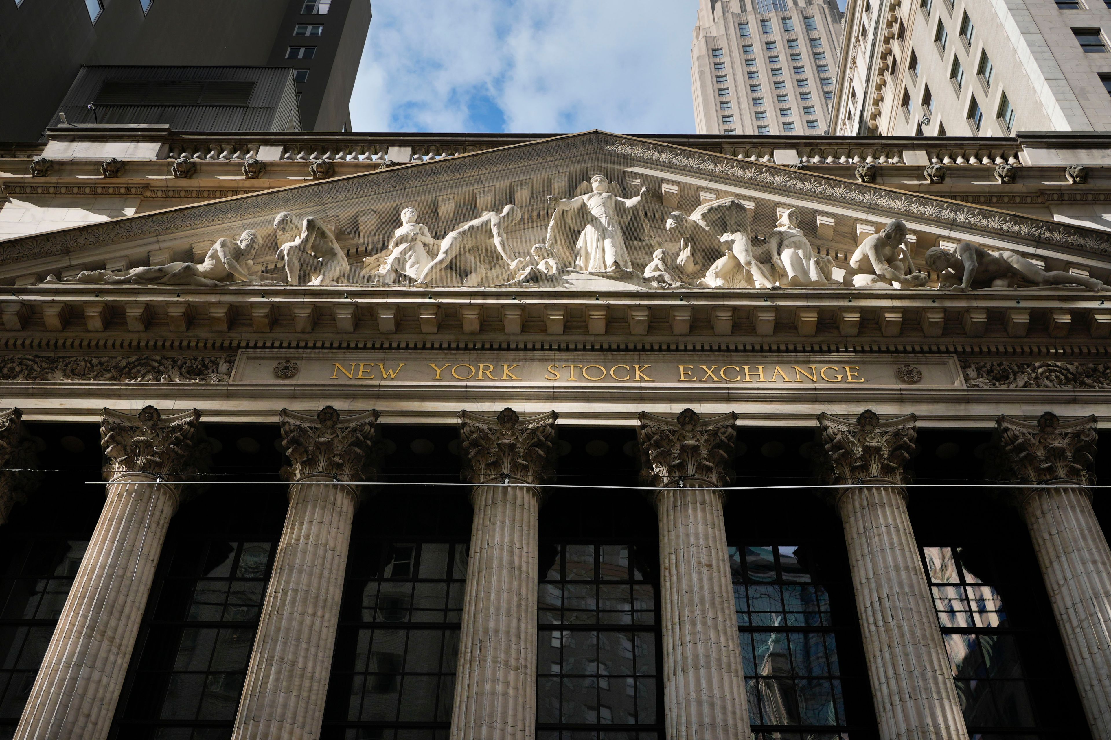 Asian shares are mostly higher after Wall St breaks its winning streak