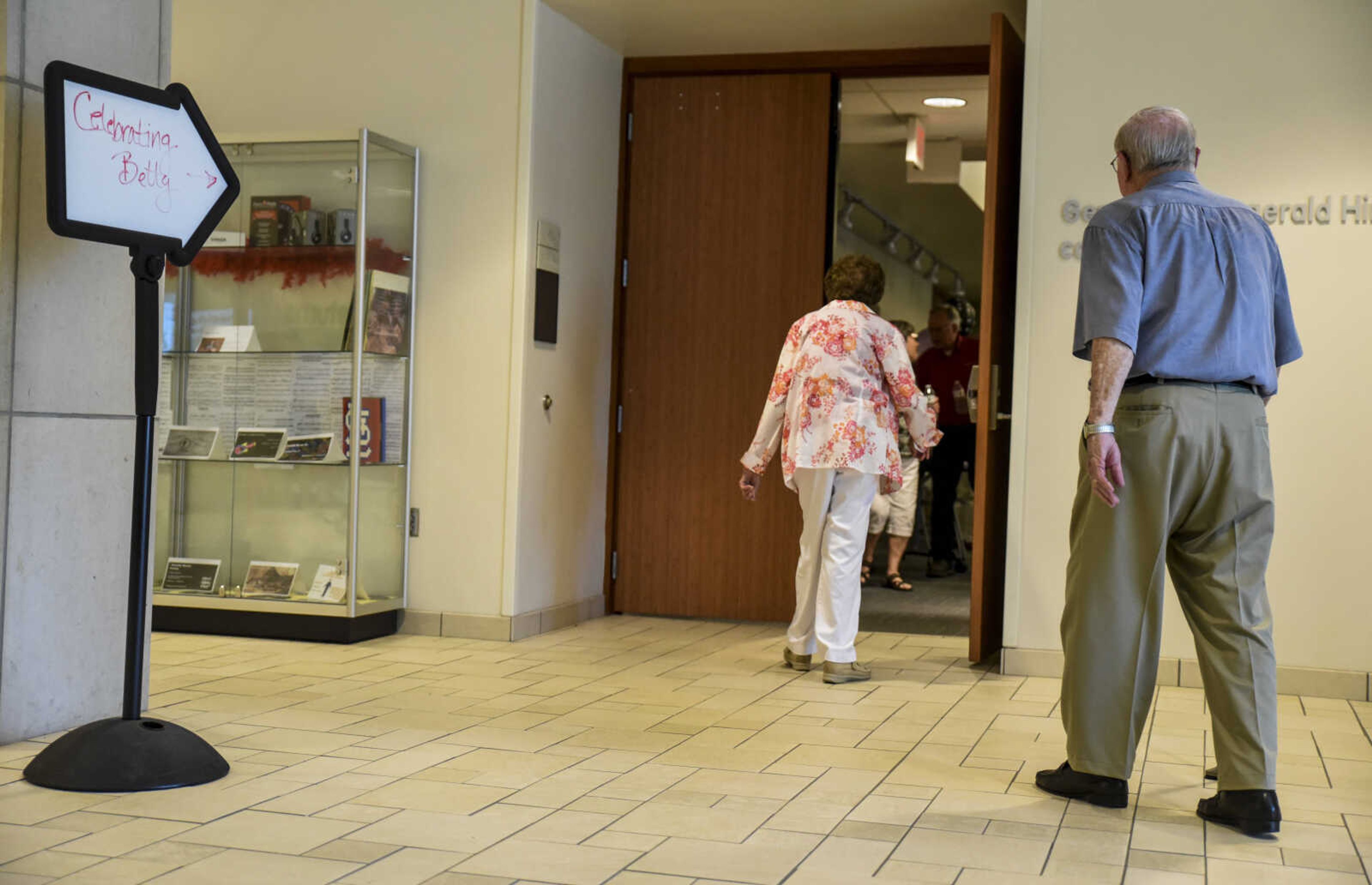 Martha and Ken Bender arrive to Betty Martin's retirement open house Friday, July 13, 2018 at the Cape Girardeau Public Library.