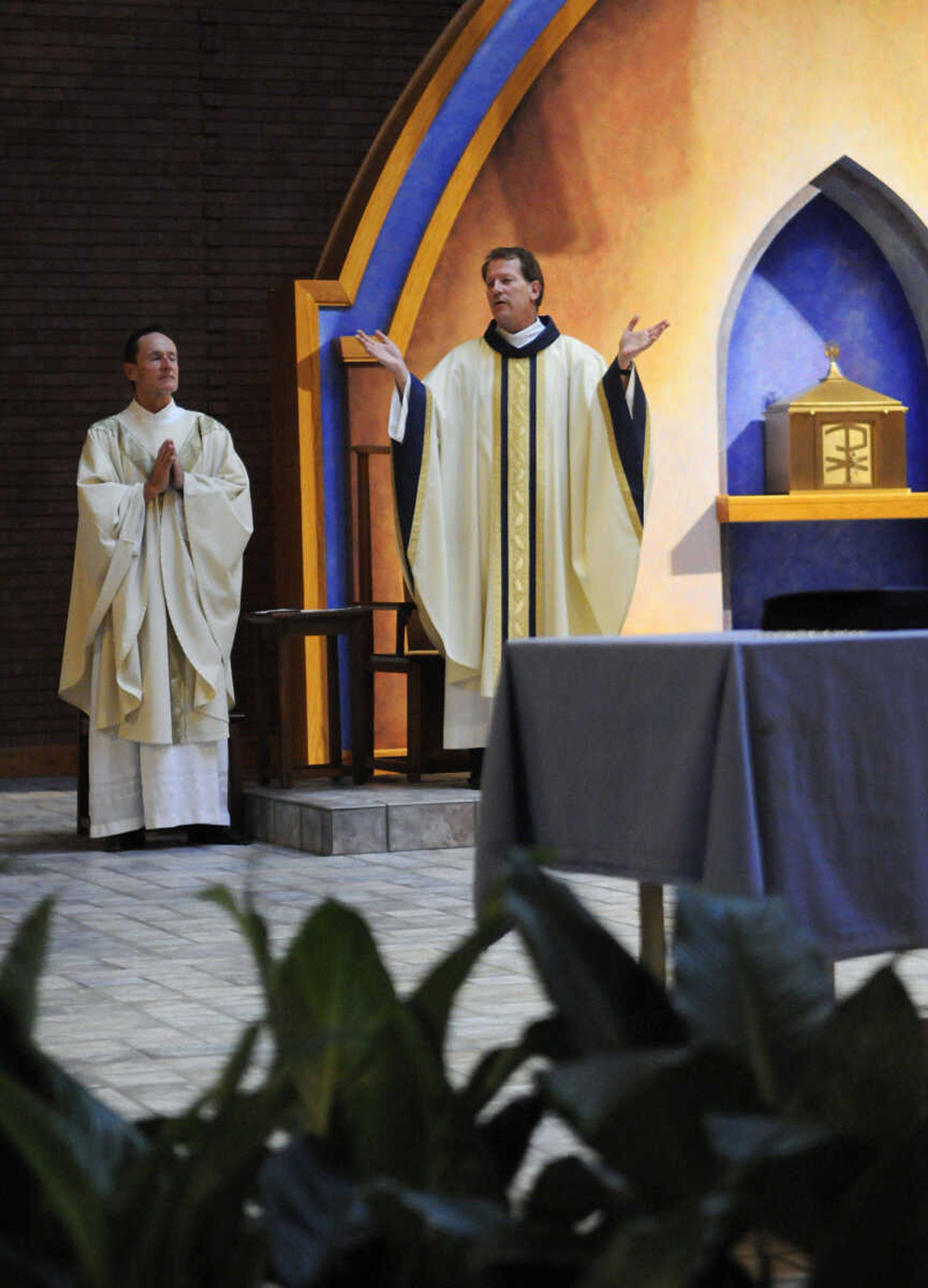 KRISTIN EBERTS ~ keberts@semissourian.com

Father Milton Ryan, left, and Father Joseph Williams lead Mass at St. Vincent De Paul parish in Perryville, Mo., on Friday, Oct. 15, 2010. The Mass was followed by an assembly to celebrate the school's recognition on the list of the best 50 Catholic secondary schools in America, presented by the Catholic High School Honor Roll. This is the first time St. Vincent has received this distinction.