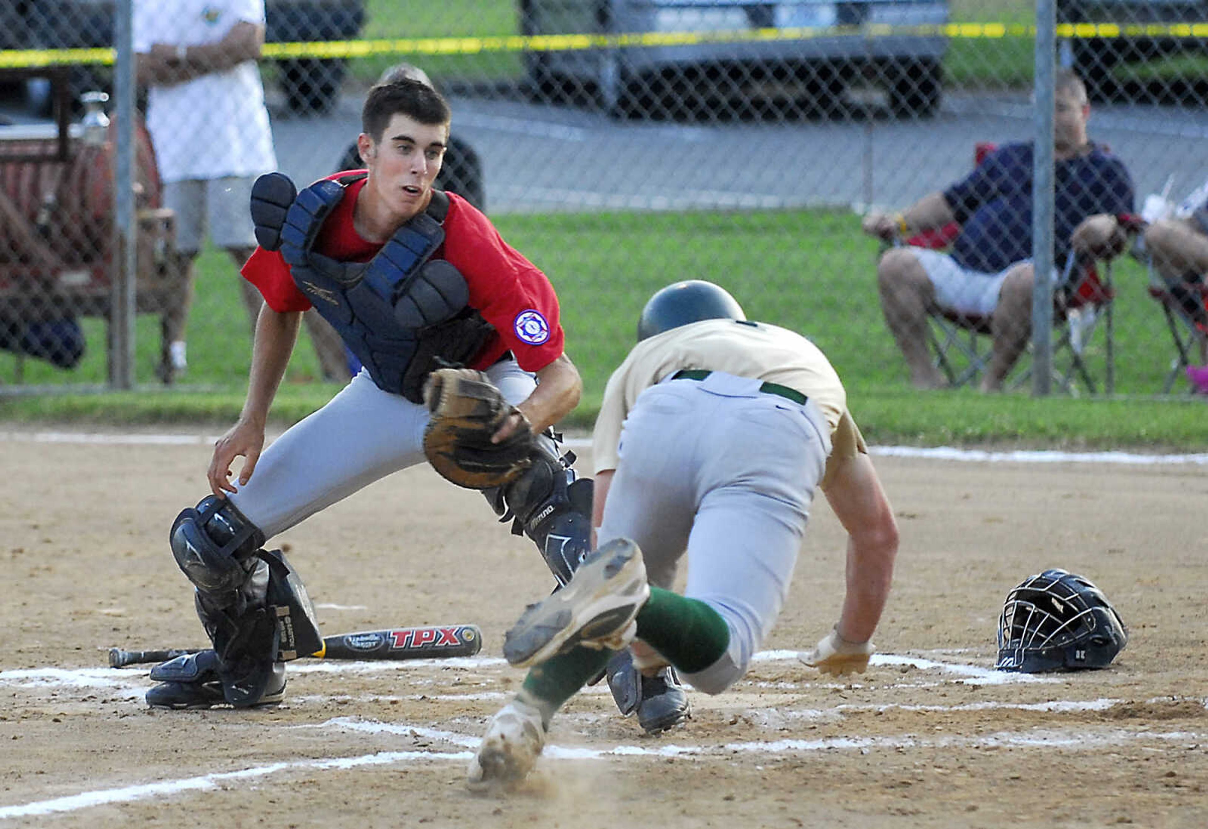 KIT DOYLE ~ kdoyle@semissourian.com
Jackson Sr. Babe Ruth catcher Bret Steffens tags out New Madrid's Kyle Marshall to end the first inning Friday, July 24, 2009, at Jackson City Park.