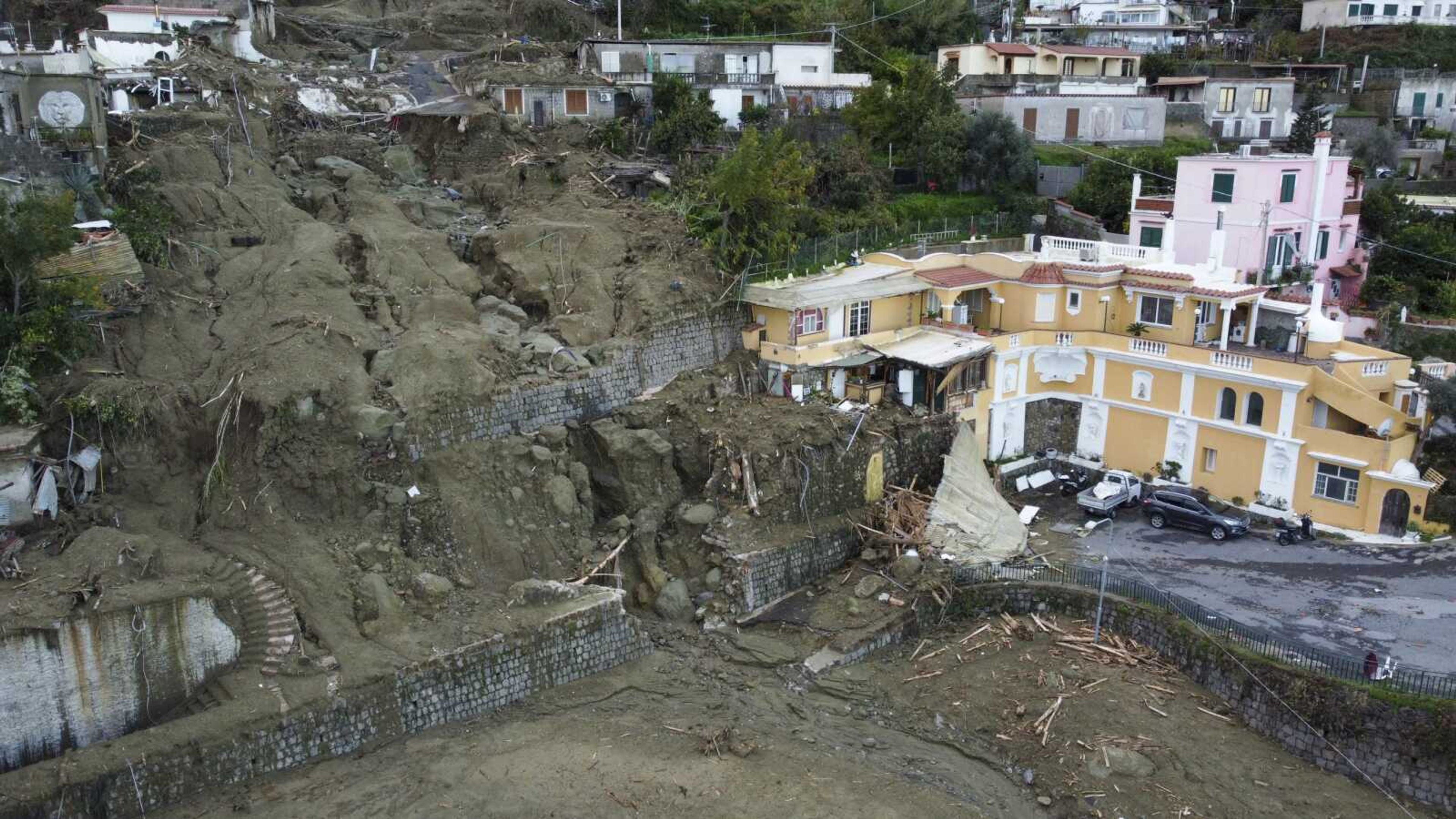 An aerial view Sunday of damaged houses after heavy rainfall triggered landslides Saturday that collapsed buildings and left as many as 12 people missing in Casamicciola, on the southern Italian island of Ischia.